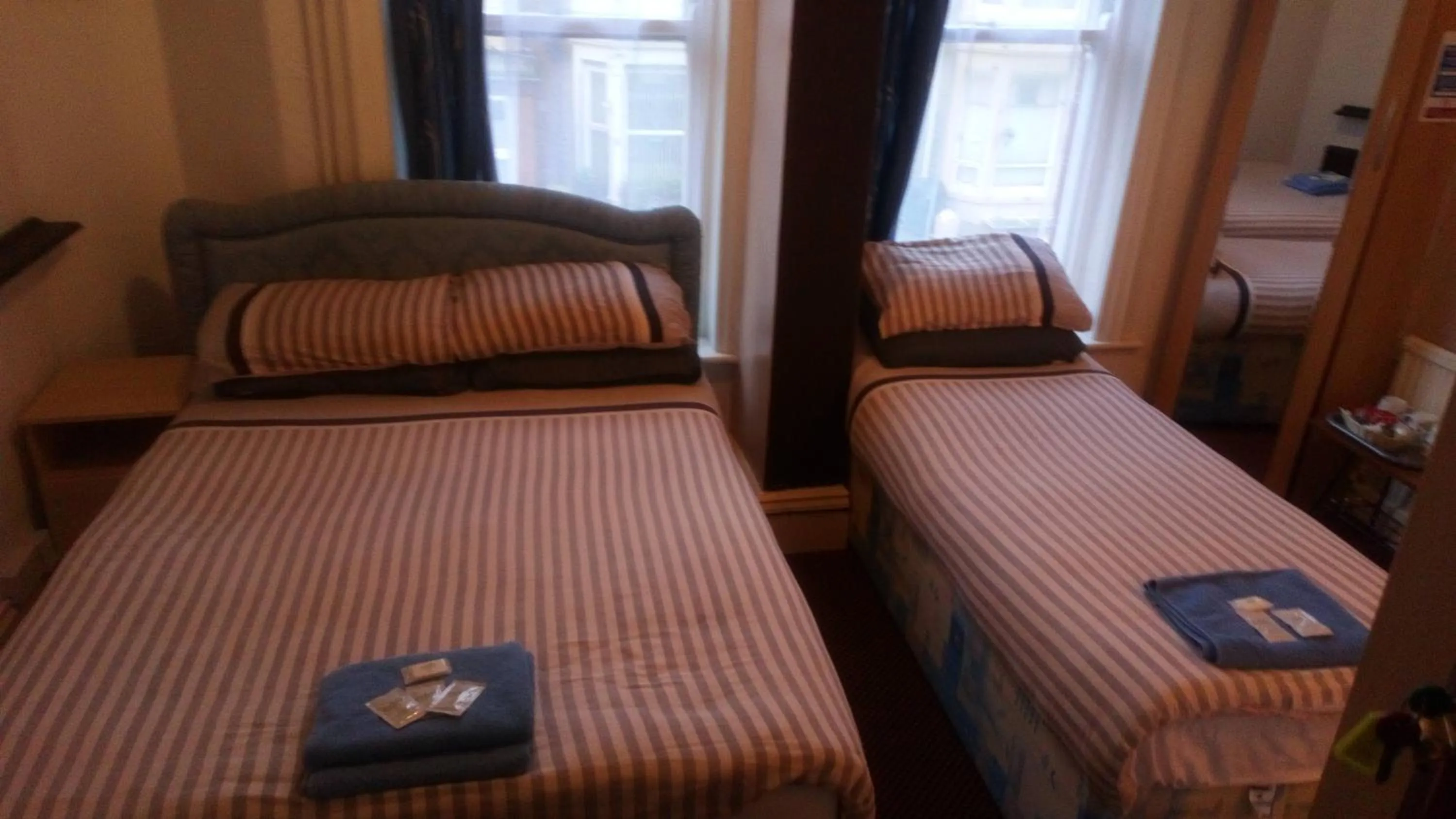 Bed in MyRoomz Golden Strand Hotel