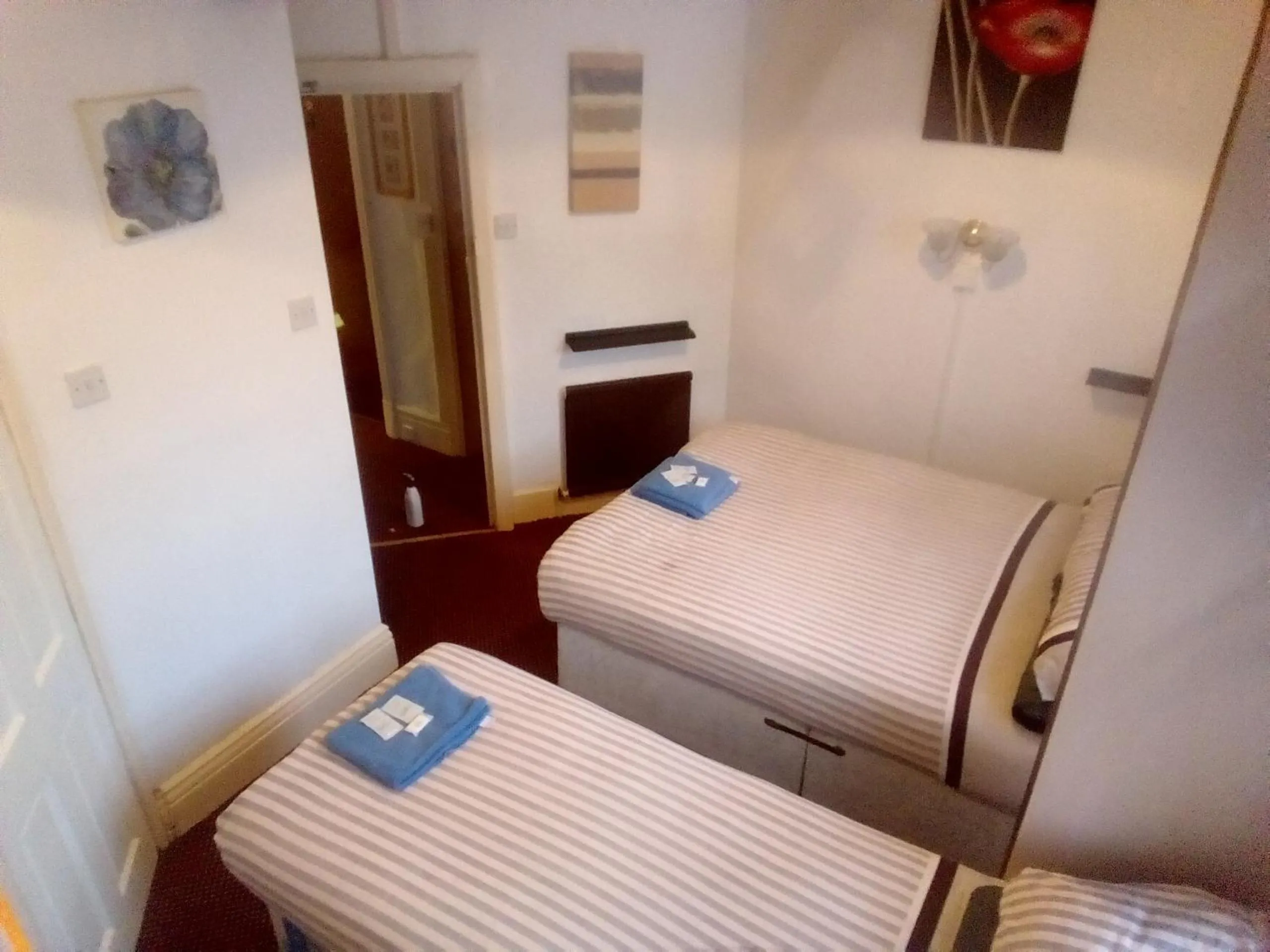 Bed in MyRoomz Golden Strand Hotel