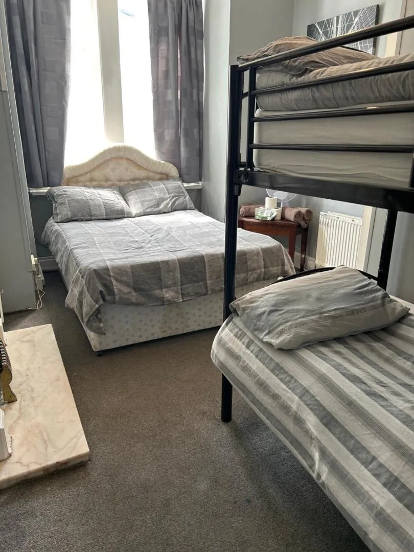 Bed in MyRoomz Golden Strand Hotel