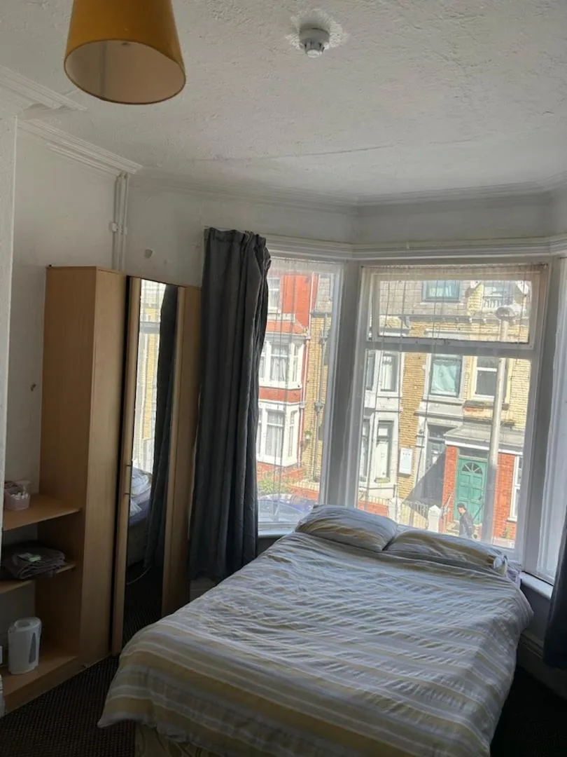 Bed in MyRoomz Golden Strand Hotel