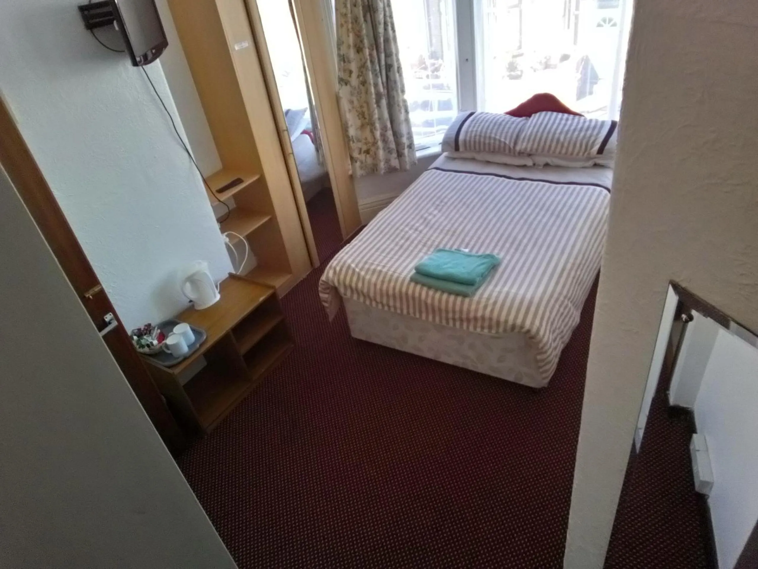 Bed in MyRoomz Golden Strand Hotel