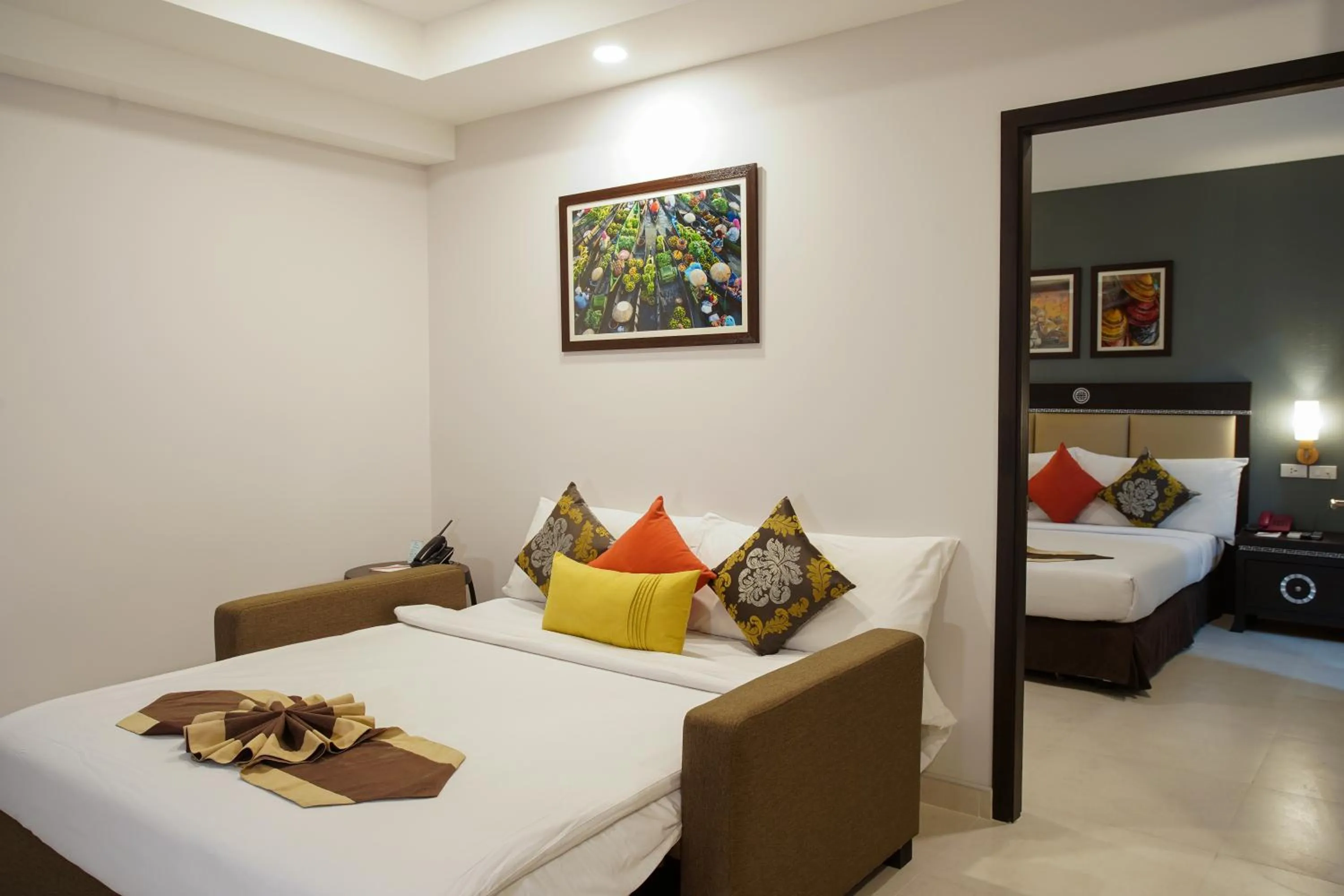 Bed in Club Mahindra Mac Boutique Hotel