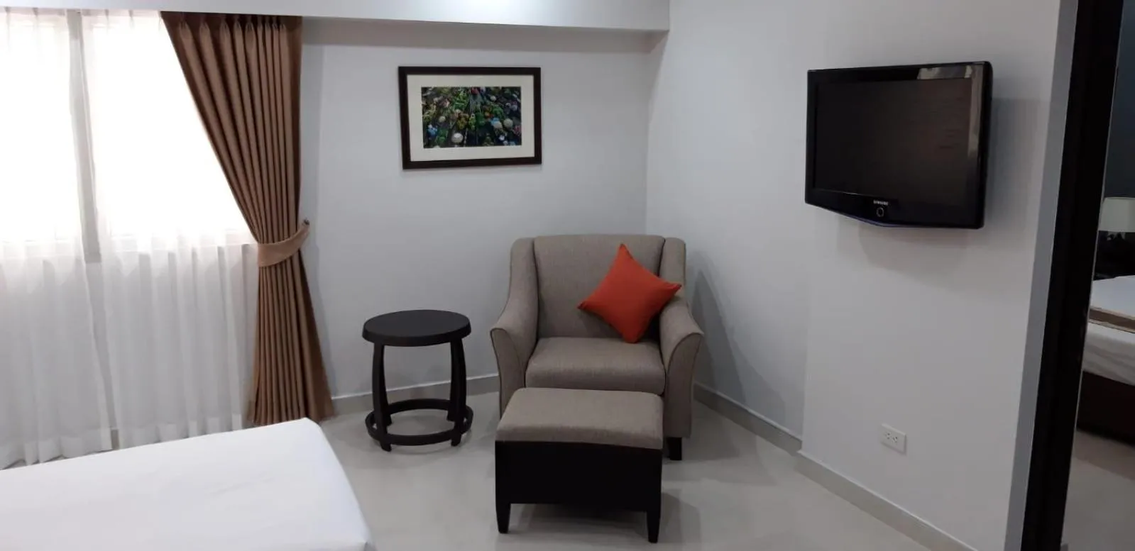 Bed in Club Mahindra Mac Boutique Hotel