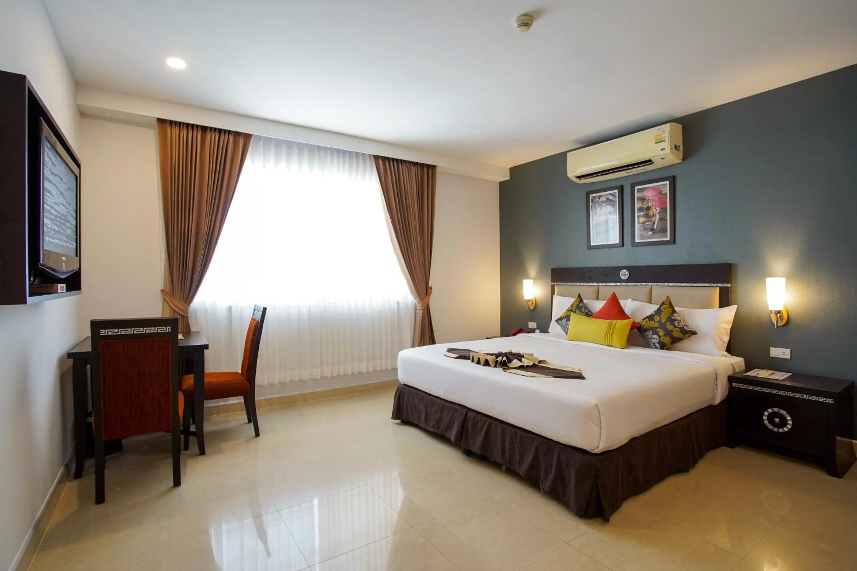 Bed in Club Mahindra Mac Boutique Hotel