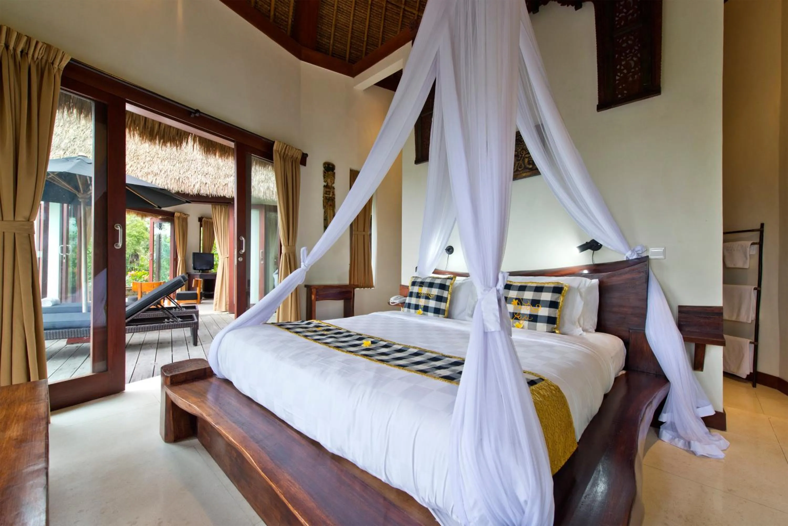 Bed in Adiwana Dara Ayu Villas