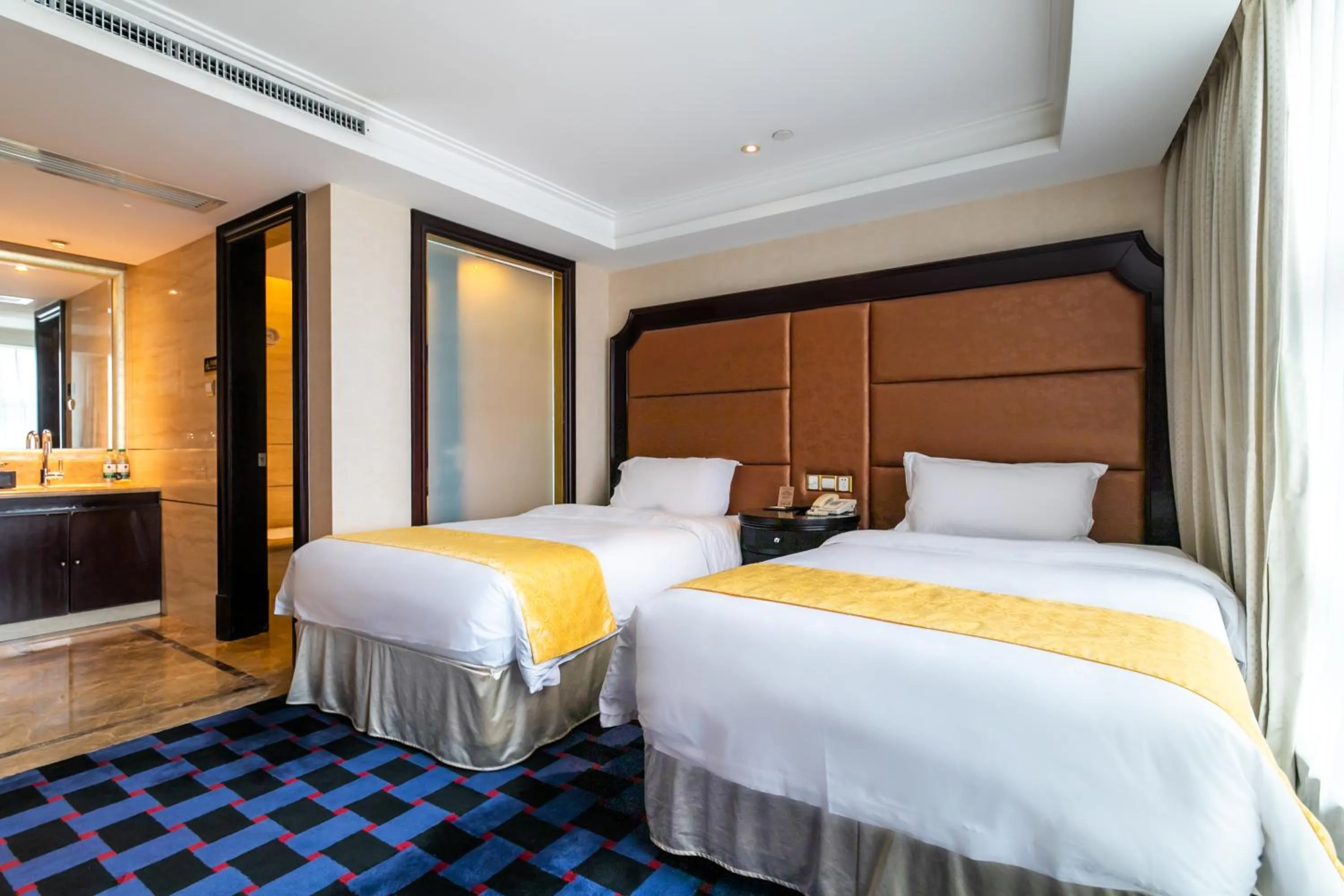 Bedroom in Royal Mediterranean Hotel