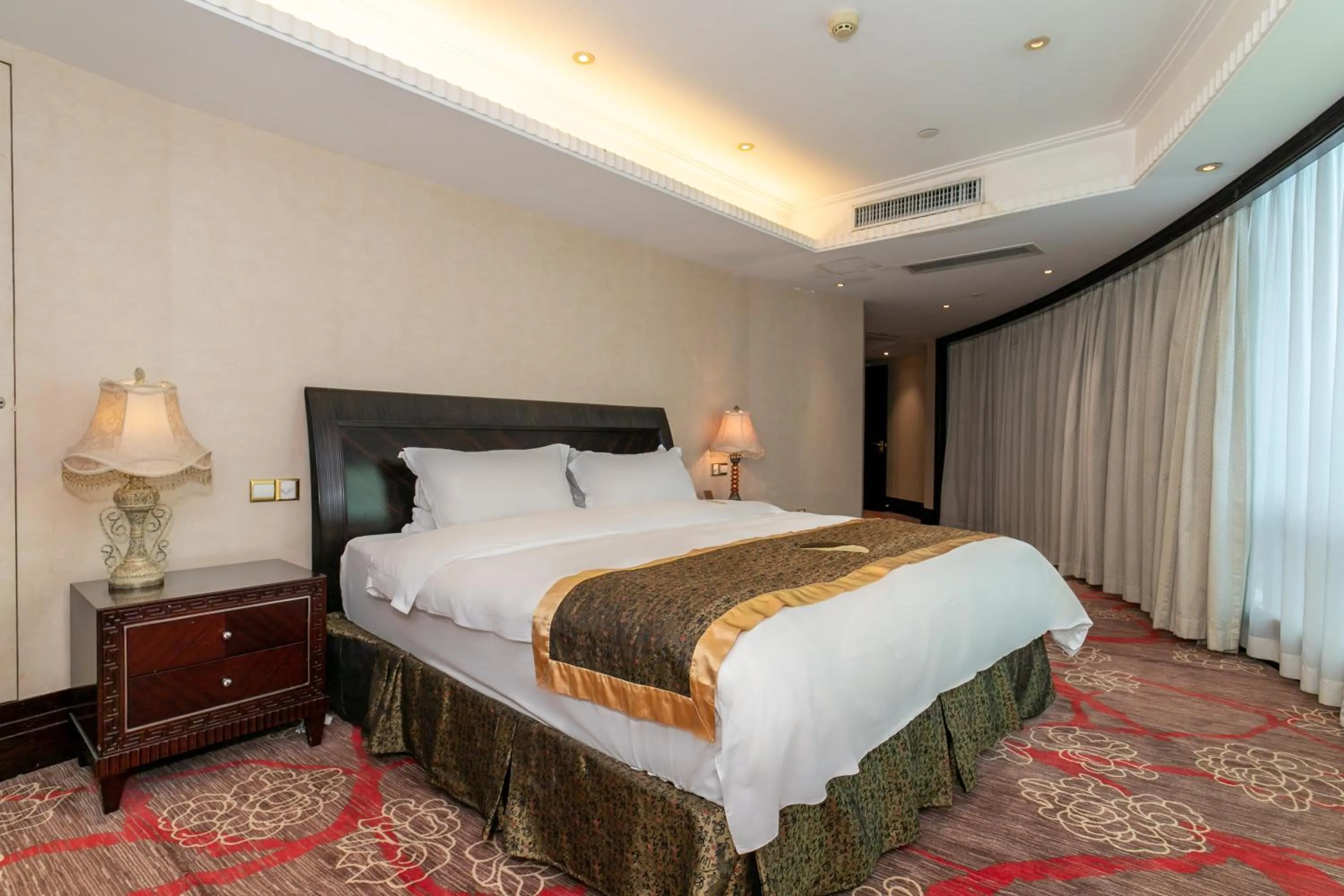 Bed in Royal Mediterranean Hotel