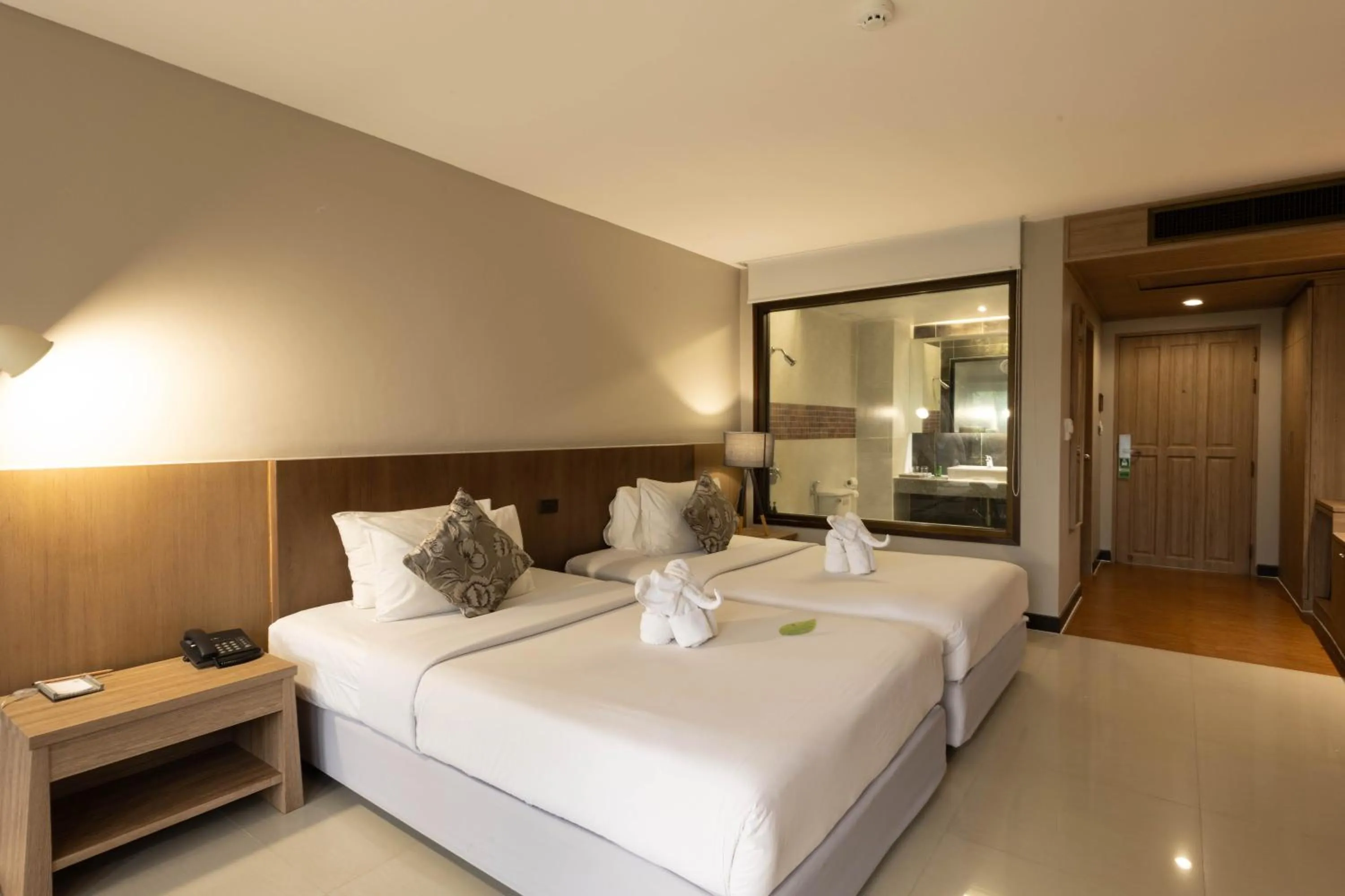 Bed in Andaman Cannacia Resort & Spa - SHA Extra Plus