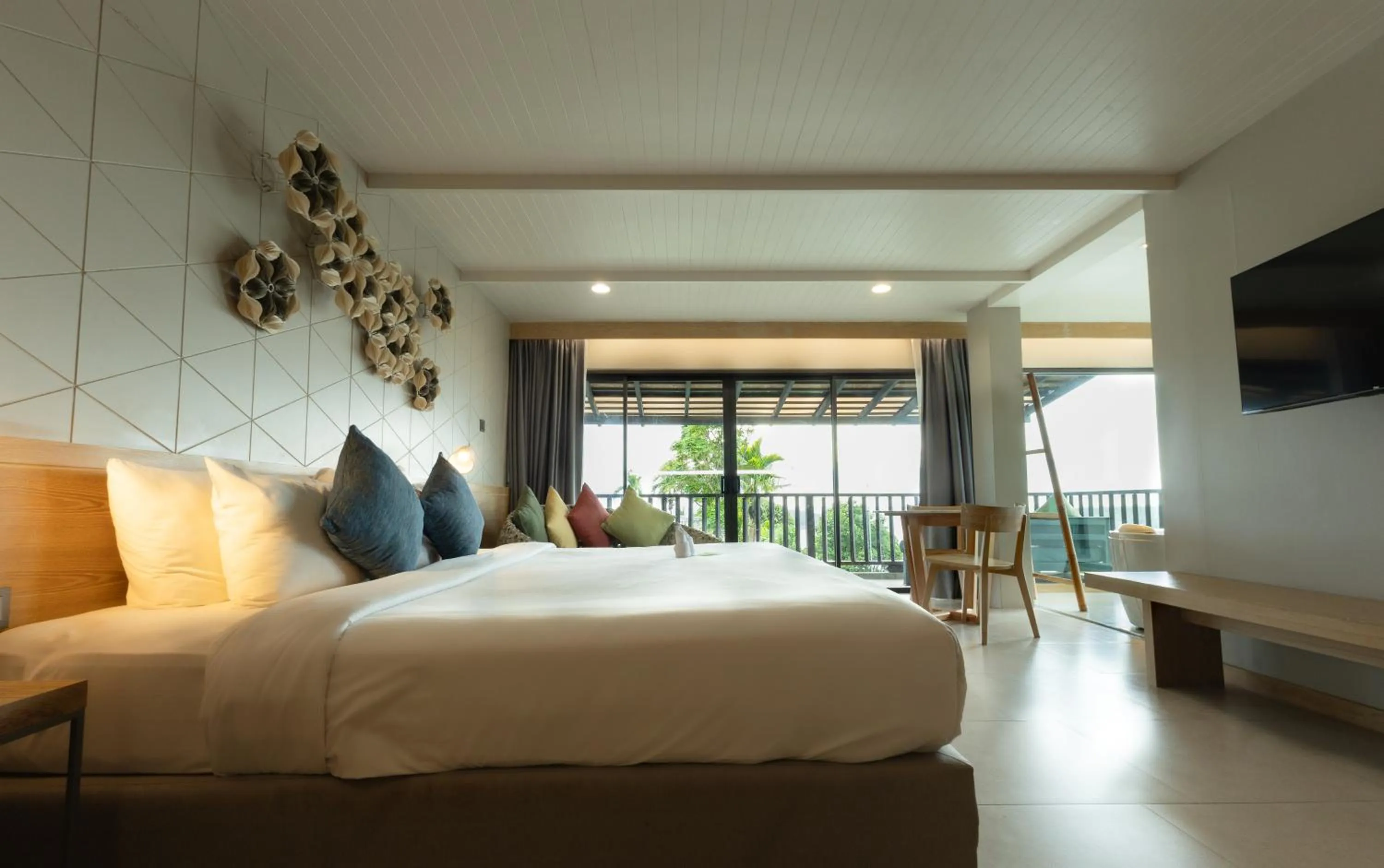 Bed in Andaman Cannacia Resort & Spa - SHA Extra Plus