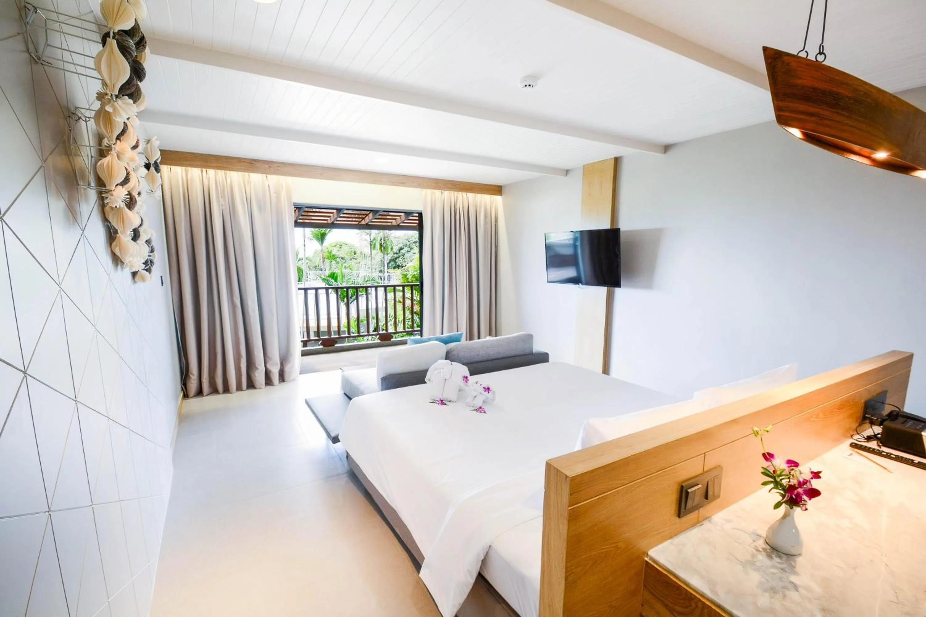 Bed in Andaman Cannacia Resort & Spa - SHA Extra Plus