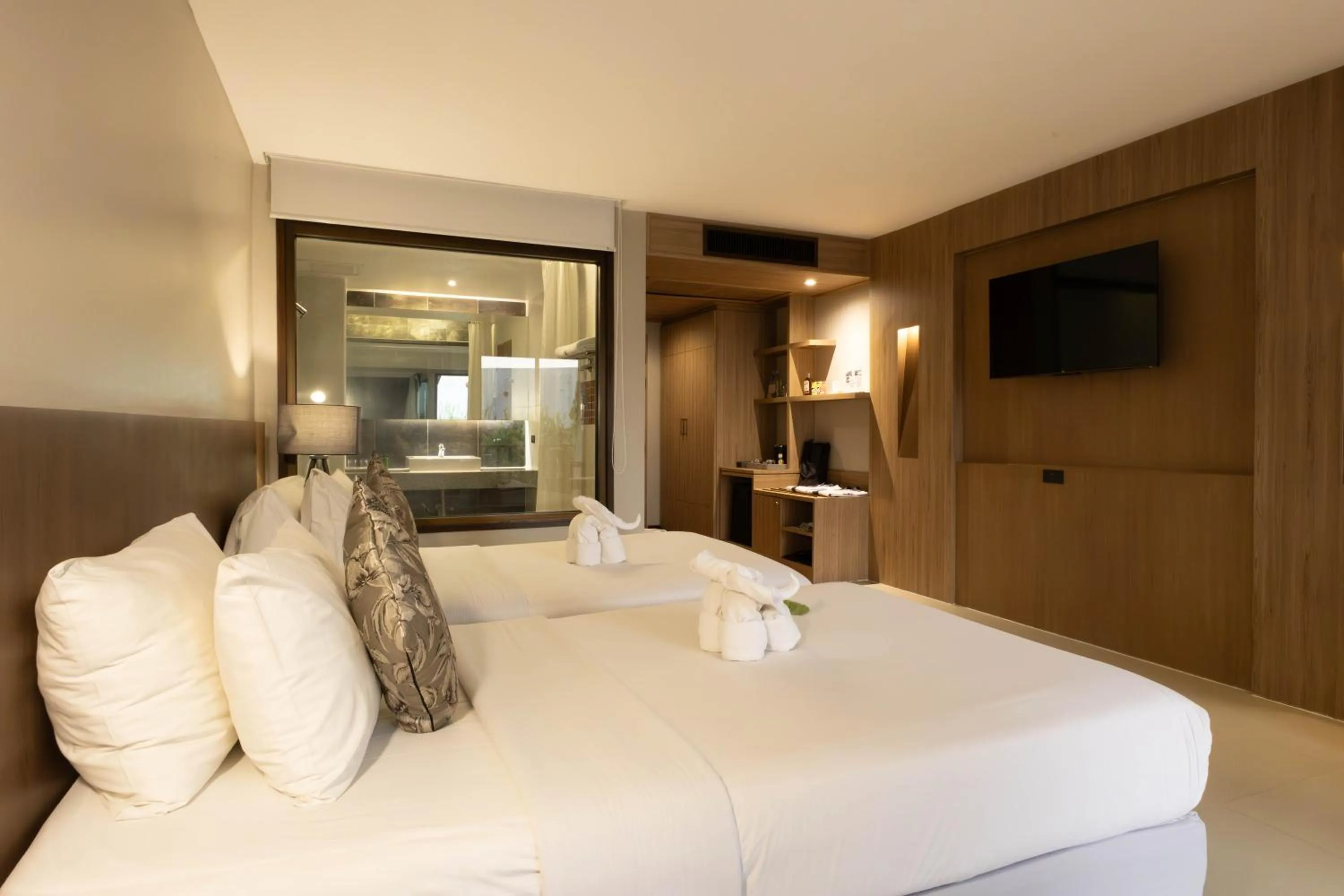 Bed in Andaman Cannacia Resort & Spa - SHA Extra Plus