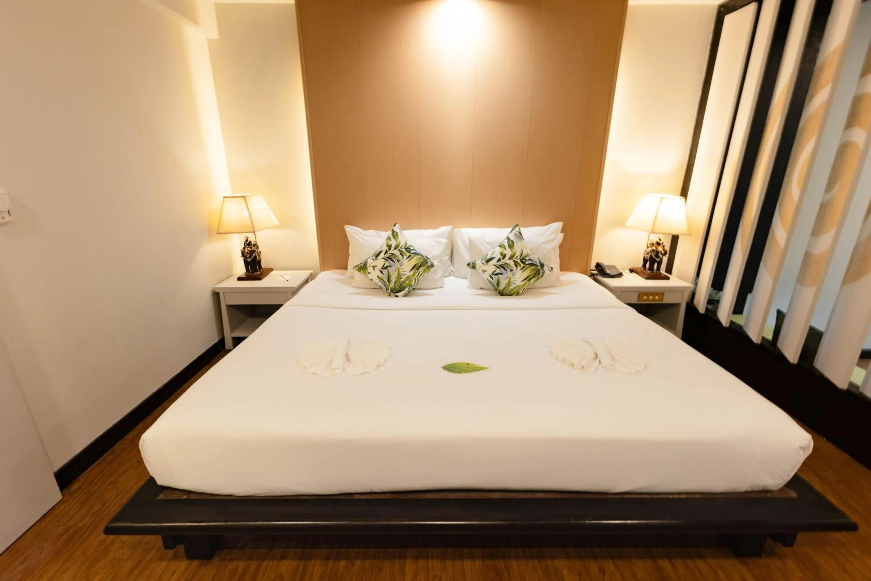 Bed in Andaman Cannacia Resort & Spa - SHA Extra Plus