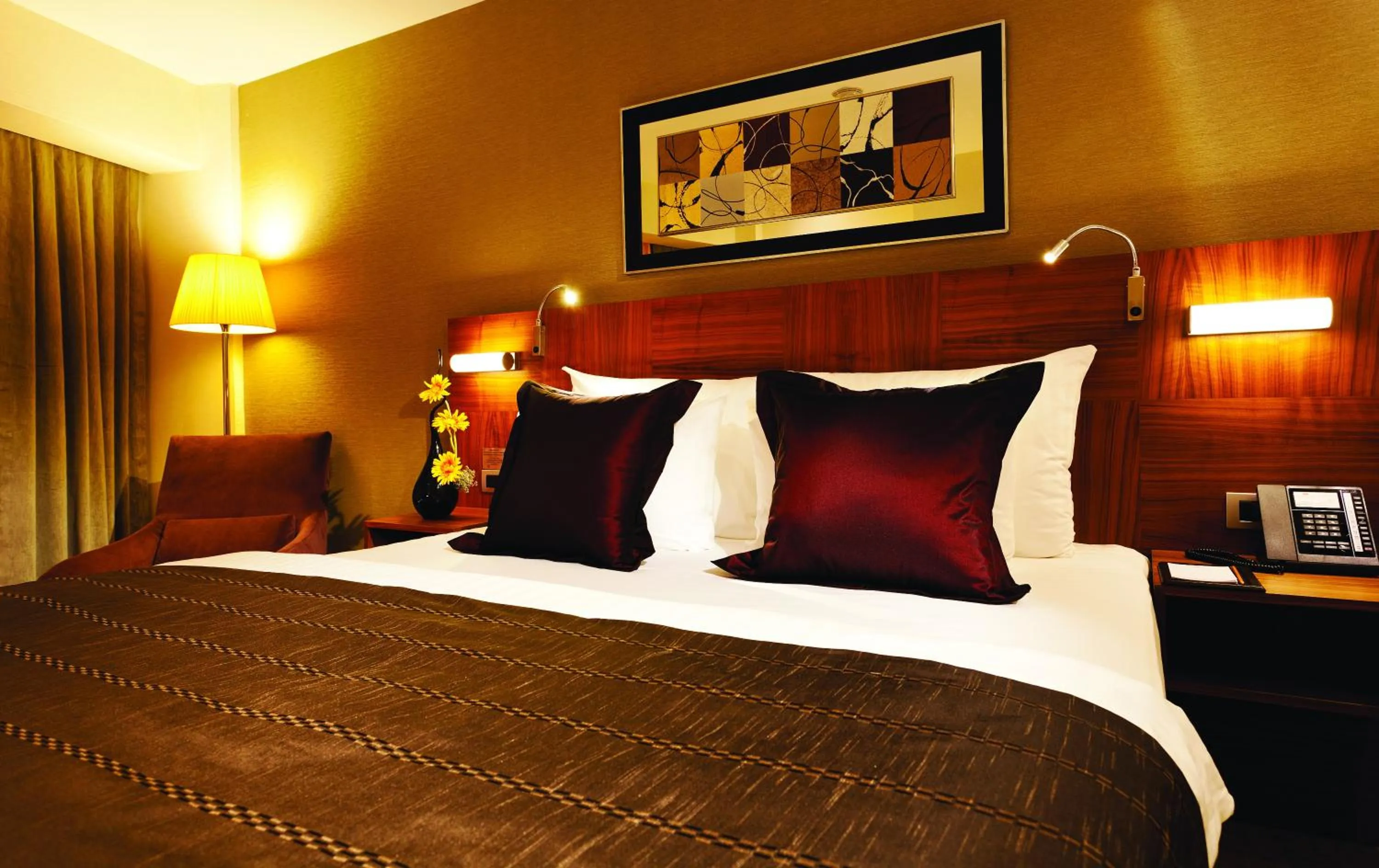 Bed in Crowne Plaza Istanbul Harbiye by IHG