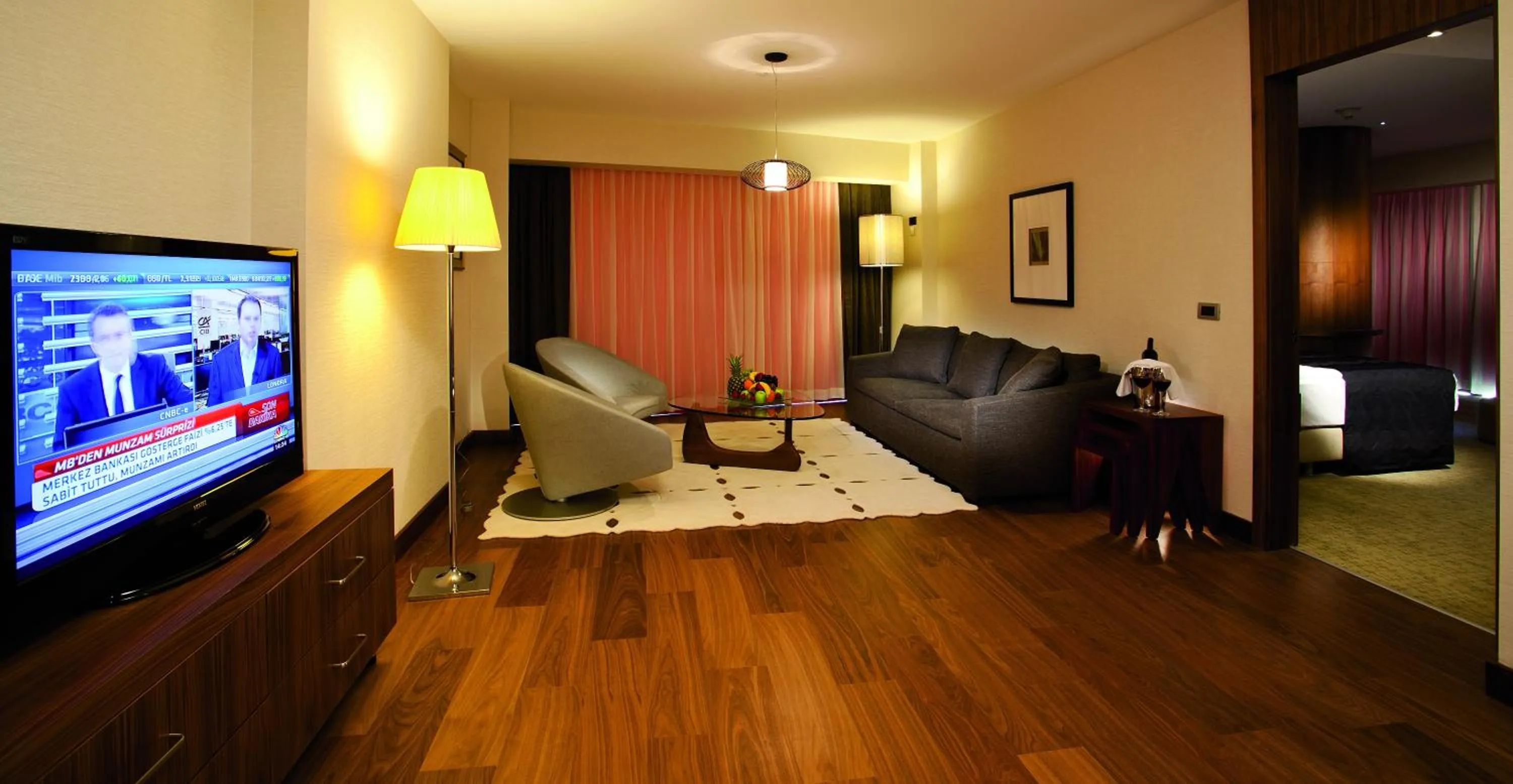 Communal lounge/ TV room in Crowne Plaza Istanbul Harbiye by IHG