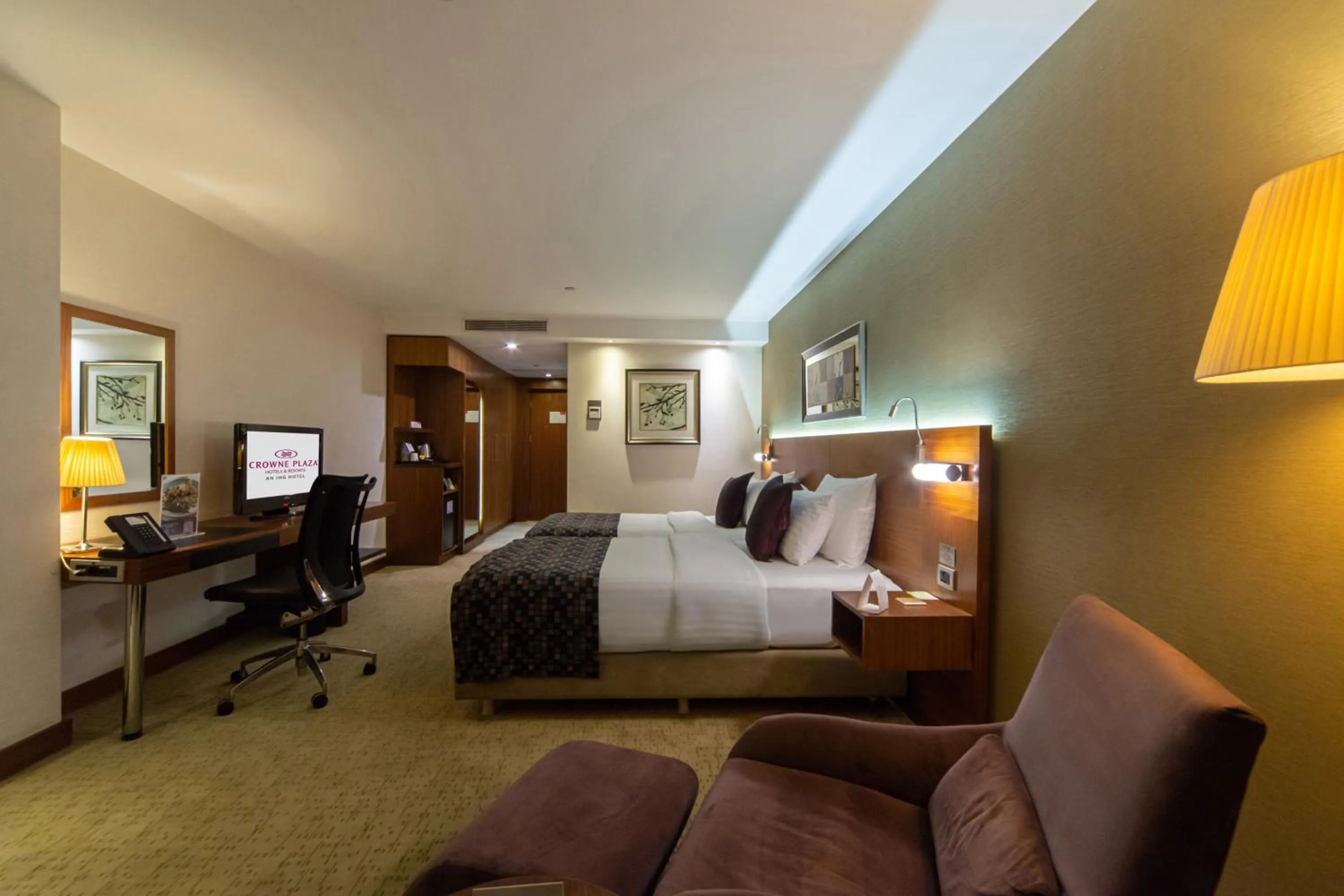 Photo of the whole room, Bed in Crowne Plaza Istanbul Harbiye by IHG