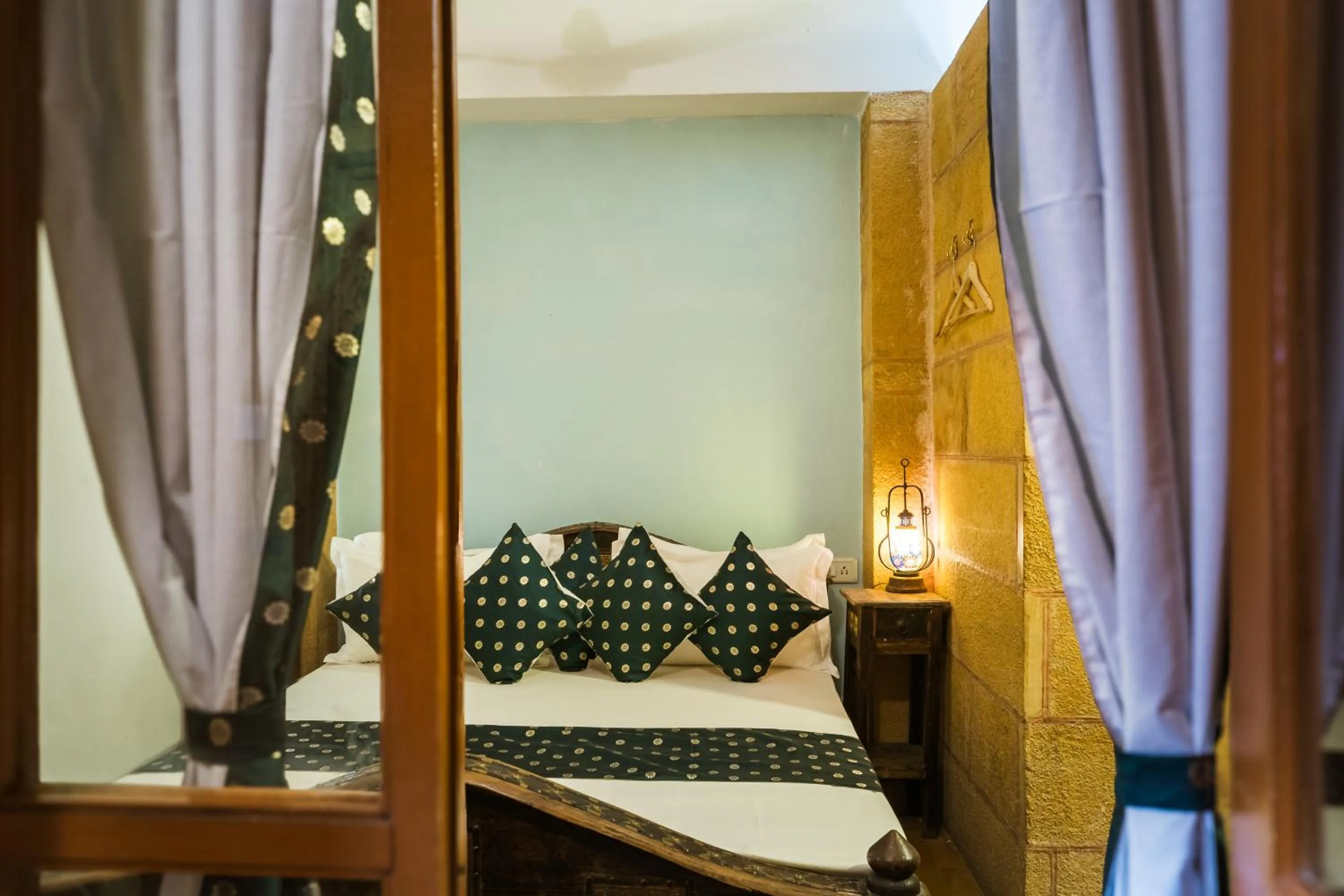 Bed in Hotel Rajmandir