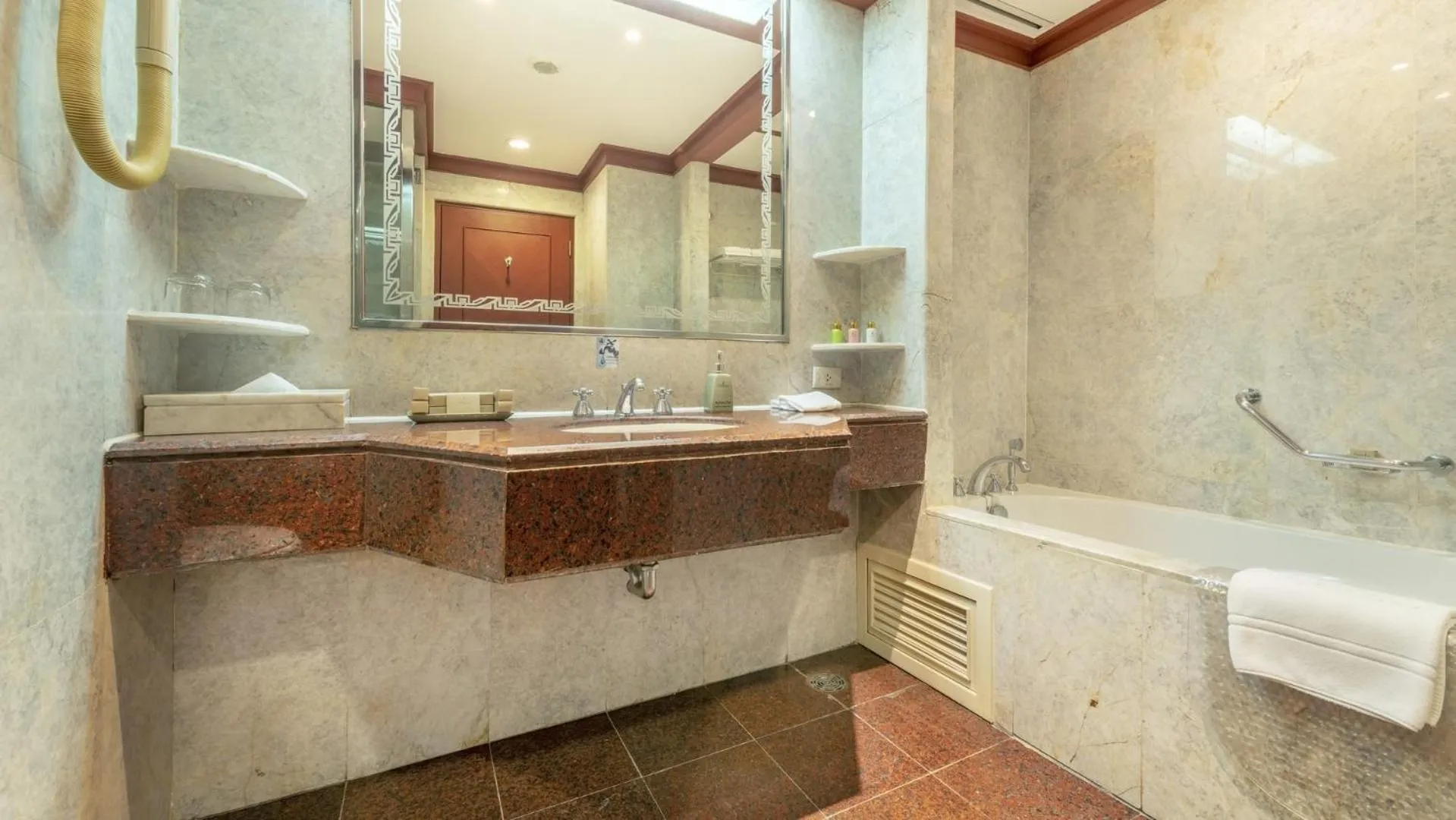 Bathroom in Ramada by Wyndham Bangkok Chaophya Park