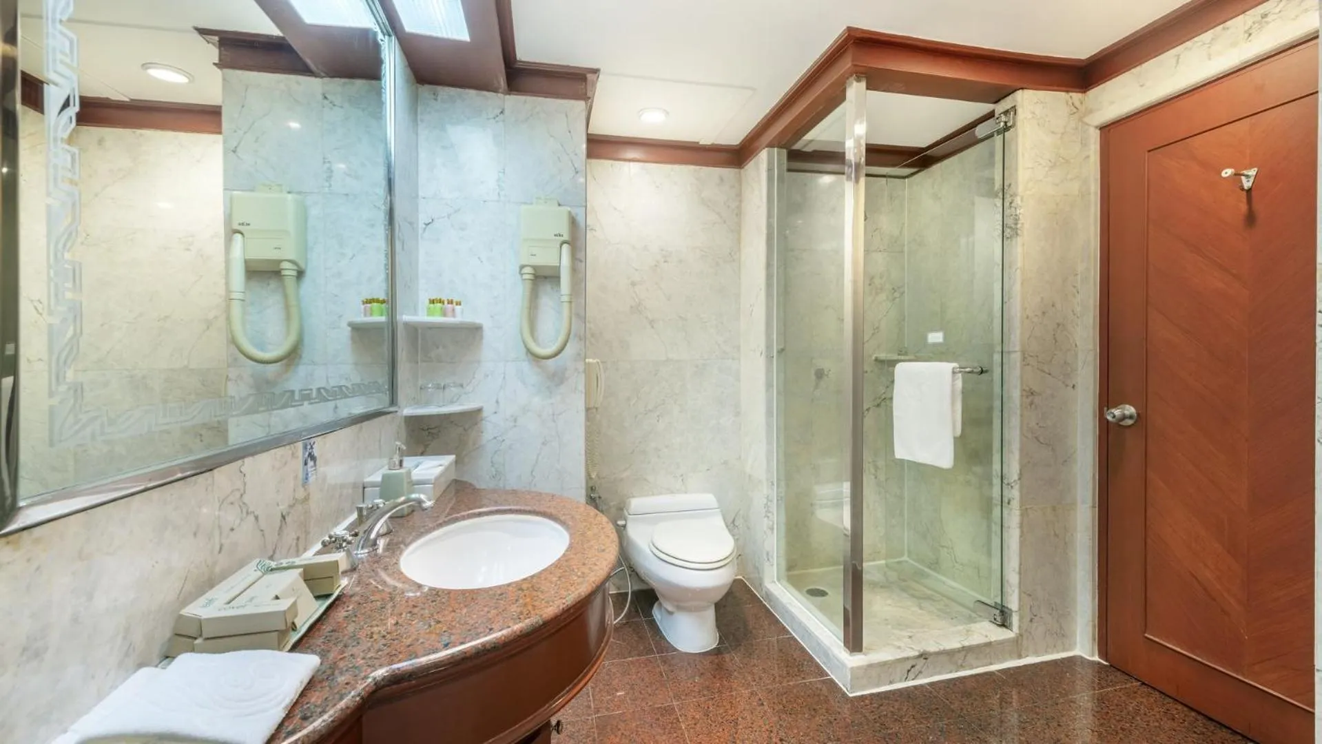 Bathroom in Ramada by Wyndham Bangkok Chaophya Park