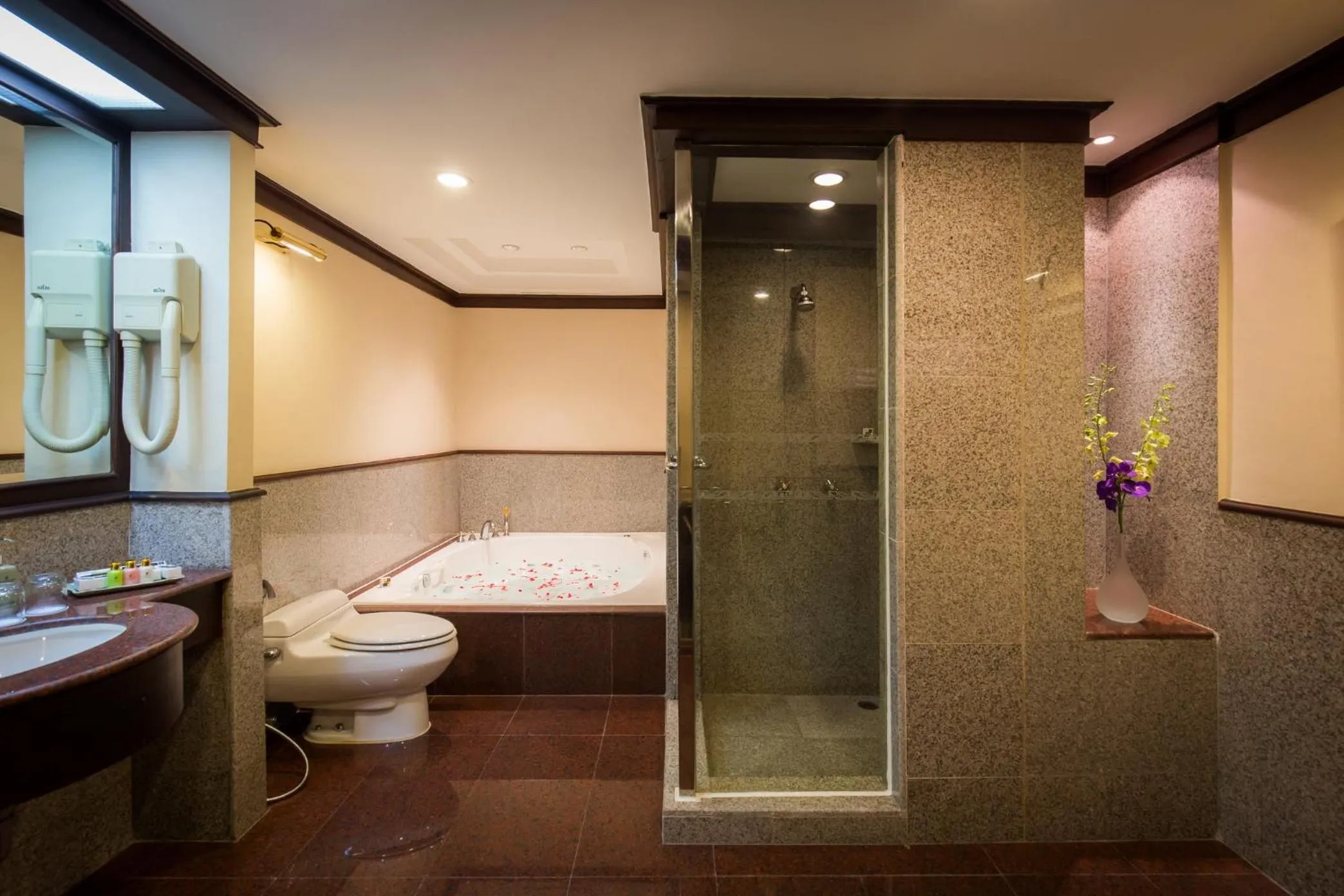 Bathroom in Ramada by Wyndham Bangkok Chaophya Park