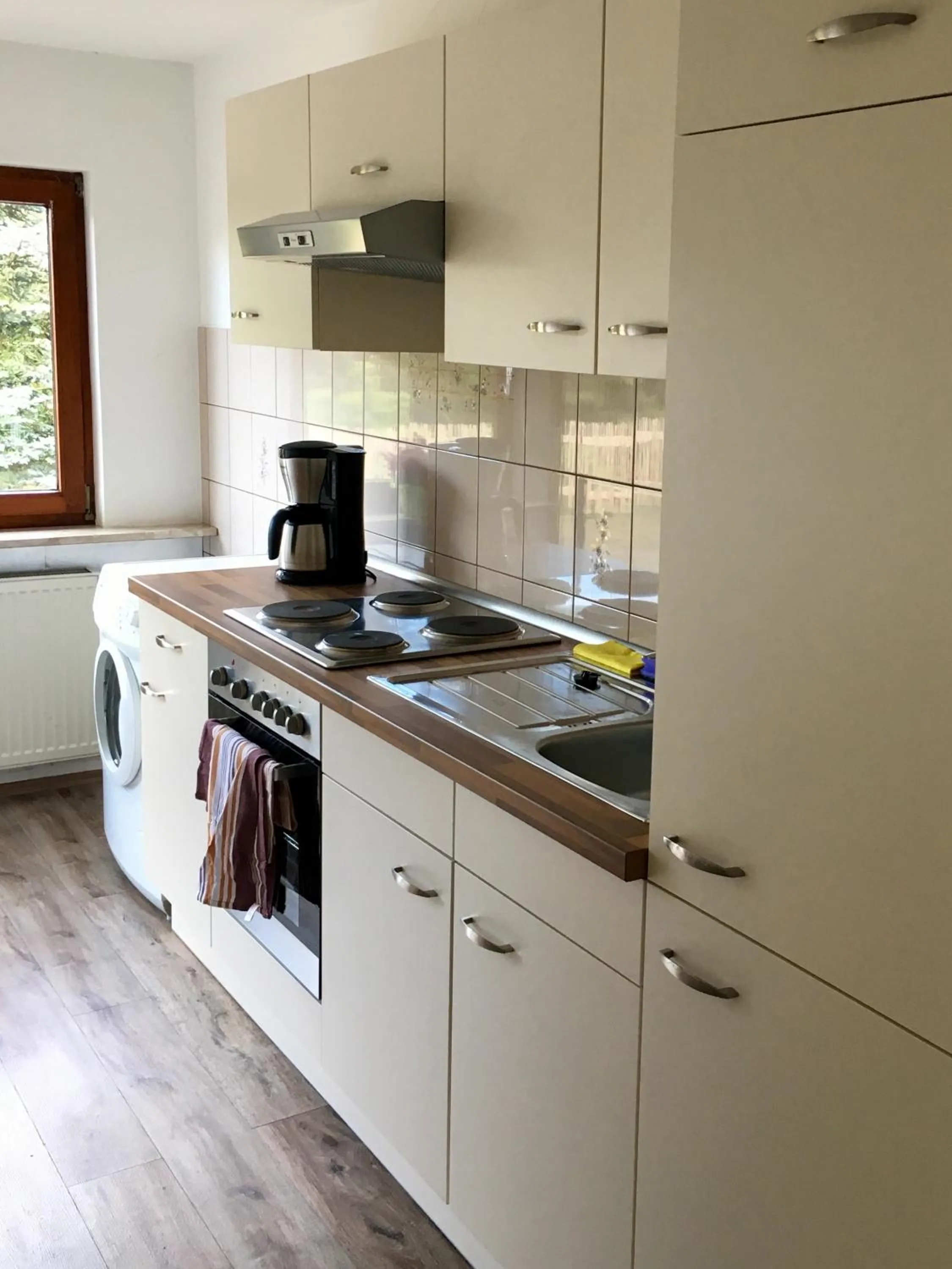 Kitchen or kitchenette in Hanse Hotel Buxtehude