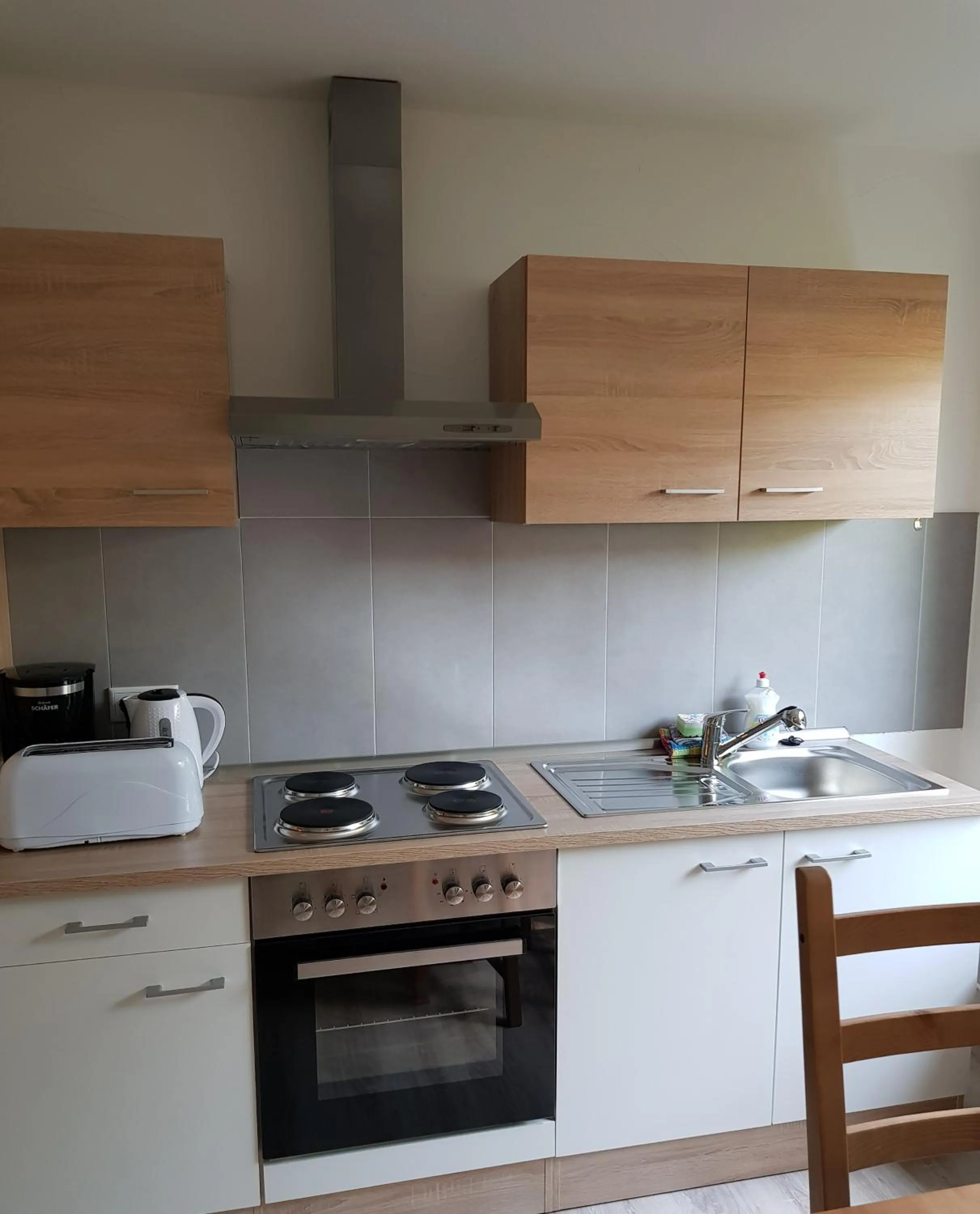 Kitchen or kitchenette in Hanse Hotel Buxtehude