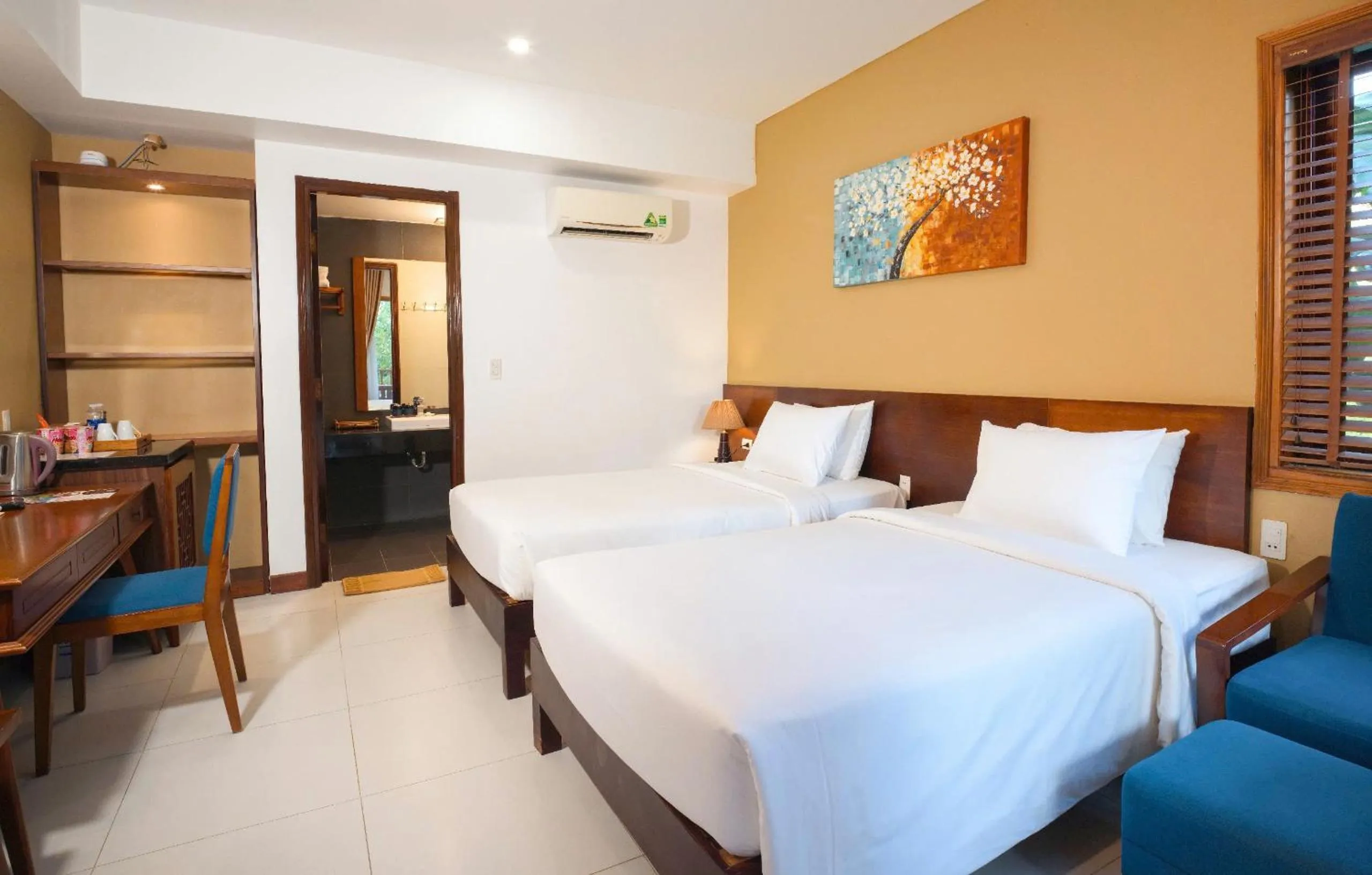 Bed in Nadine Phu Quoc Resort & Spa