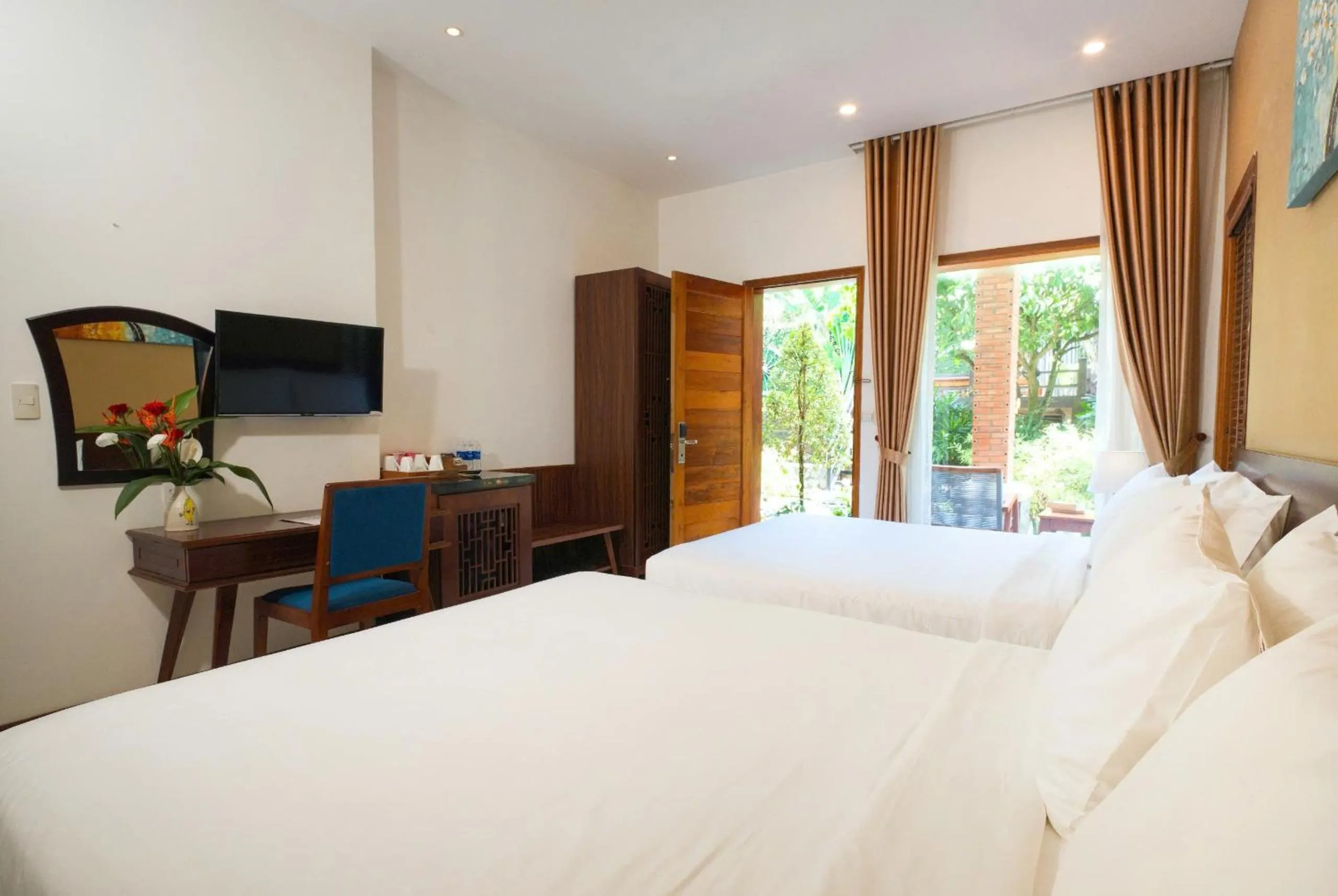 Bed in Nadine Phu Quoc Resort & Spa