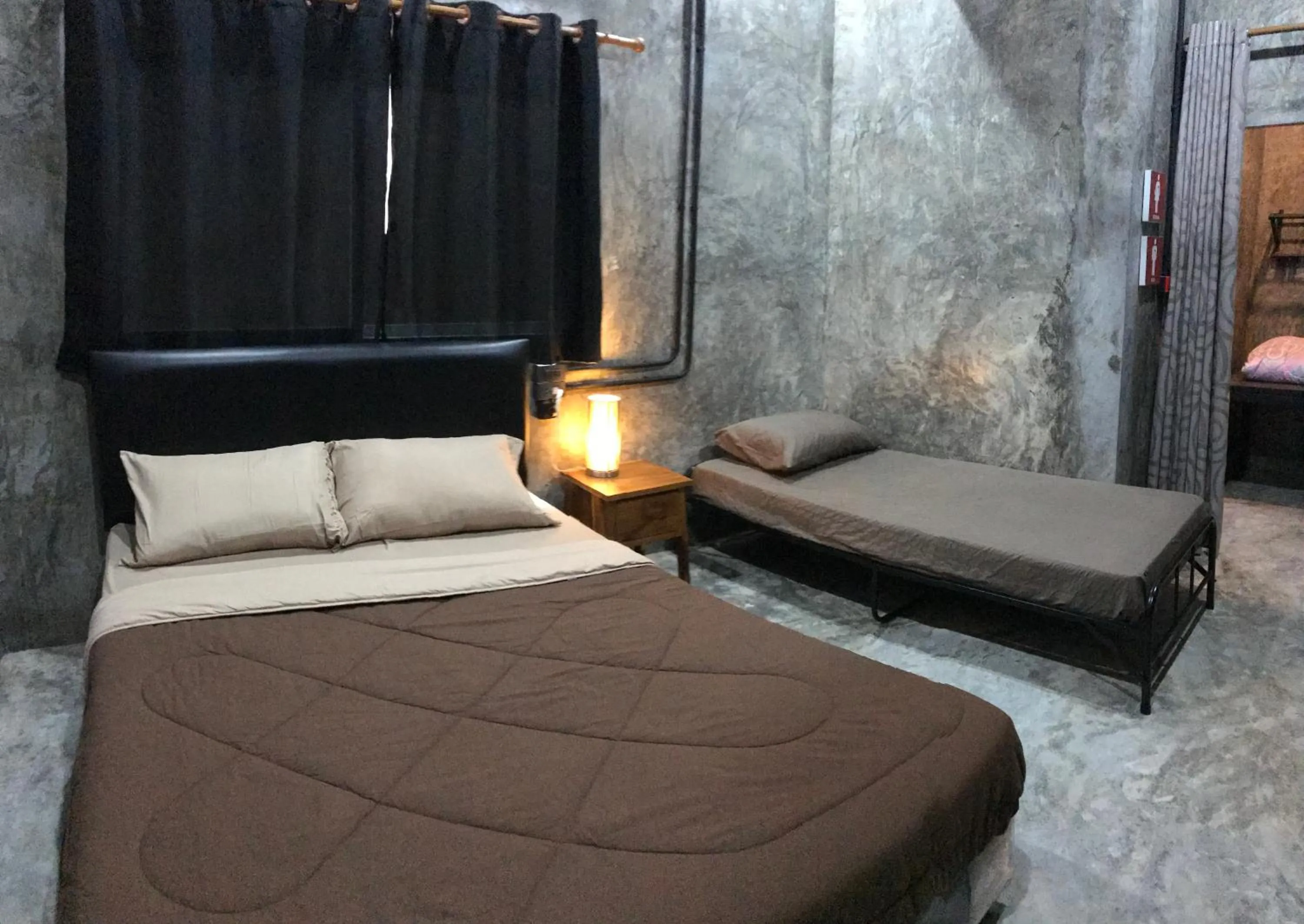 Bed in Nornlamphun Boutique Hotel