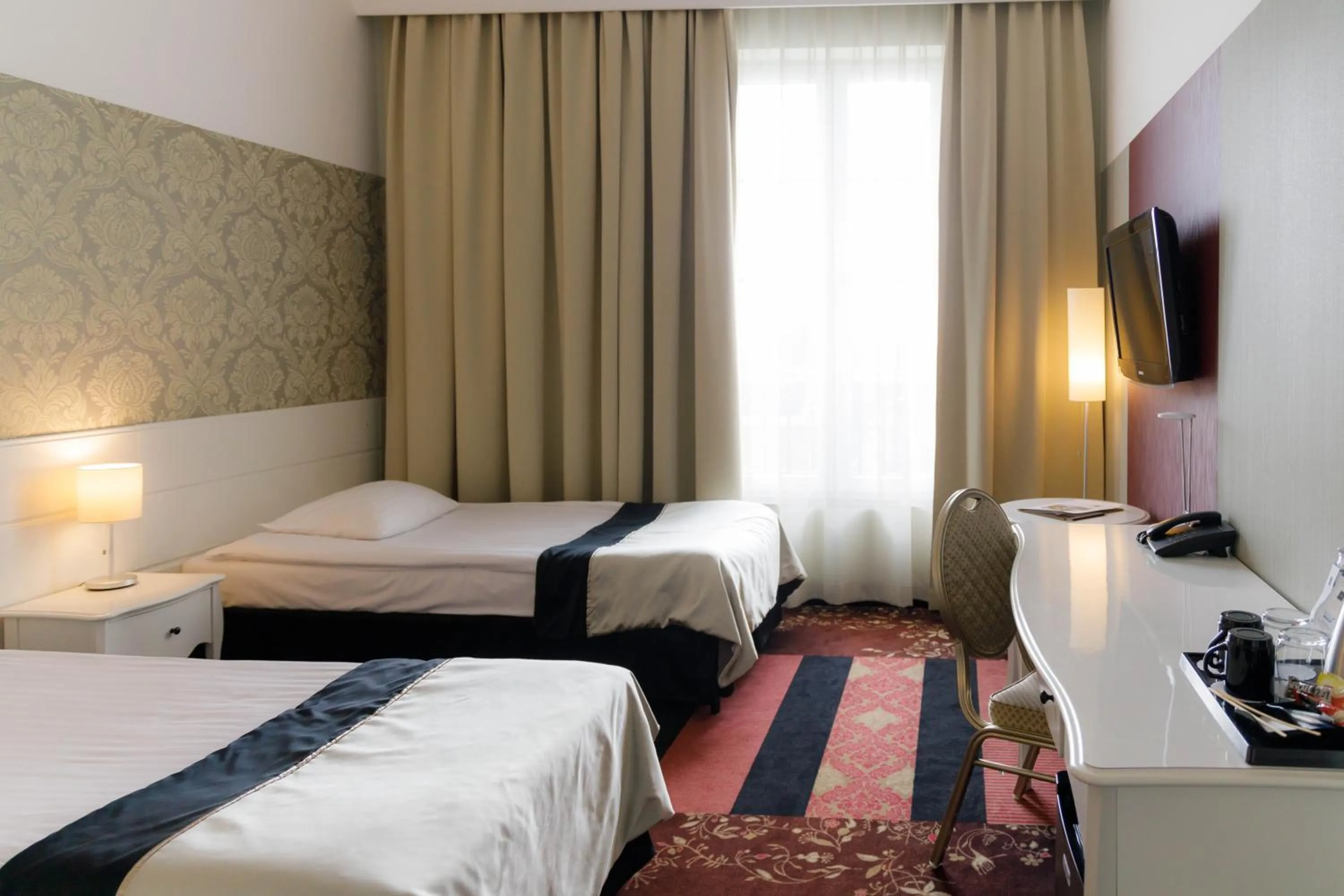 Bed in Hotel Lamberton