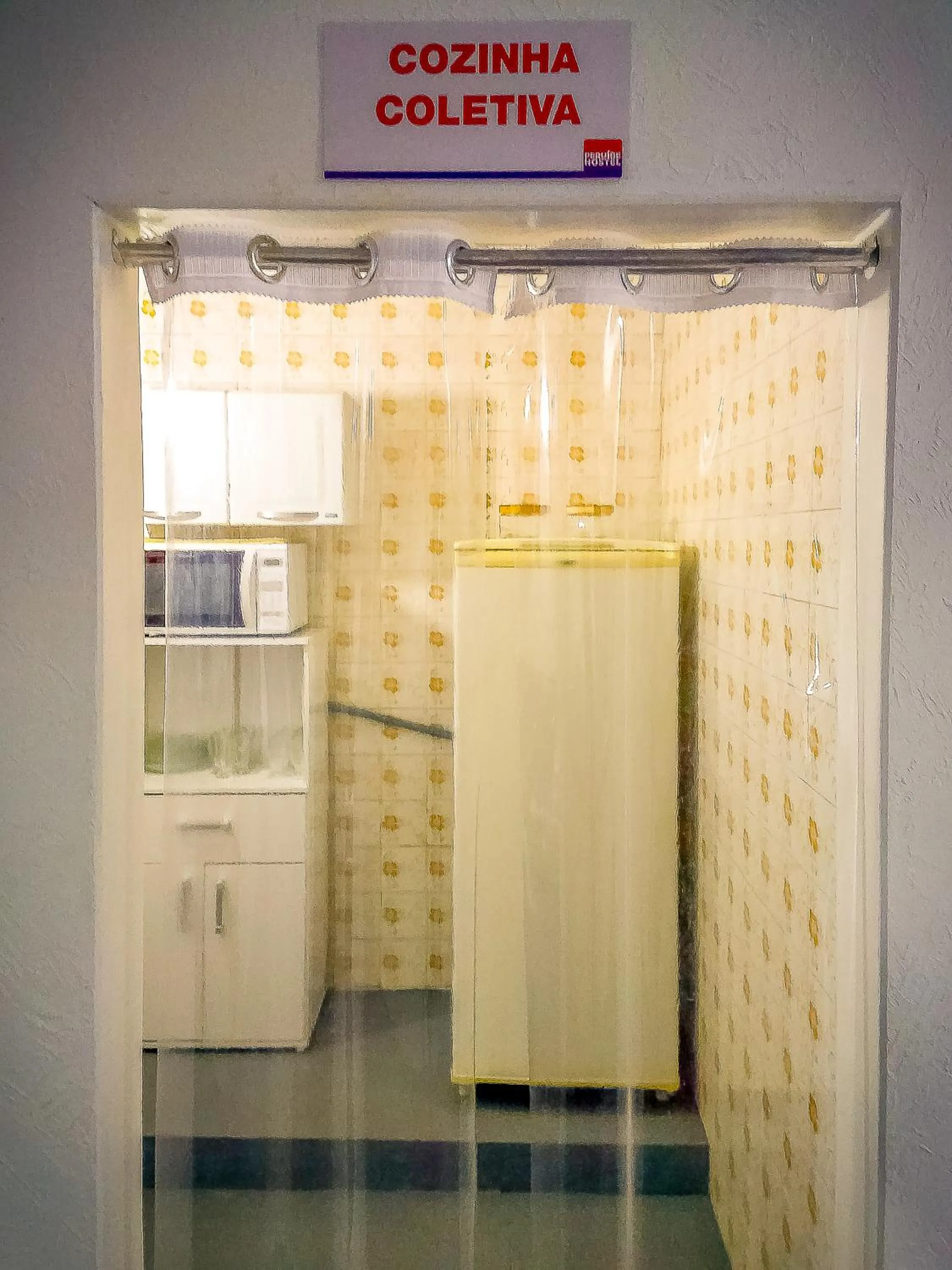 Kitchen or kitchenette in Pousada Peruibe 455