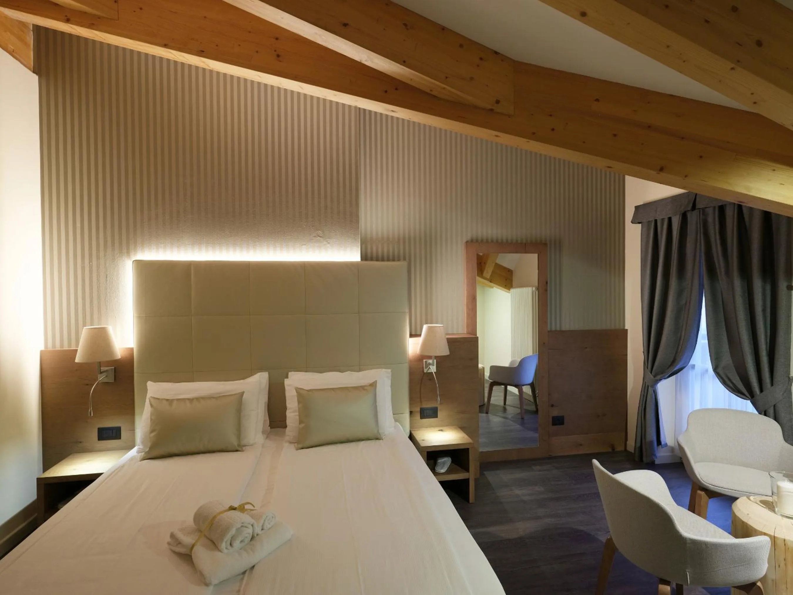 Bed in X Alp Hotel