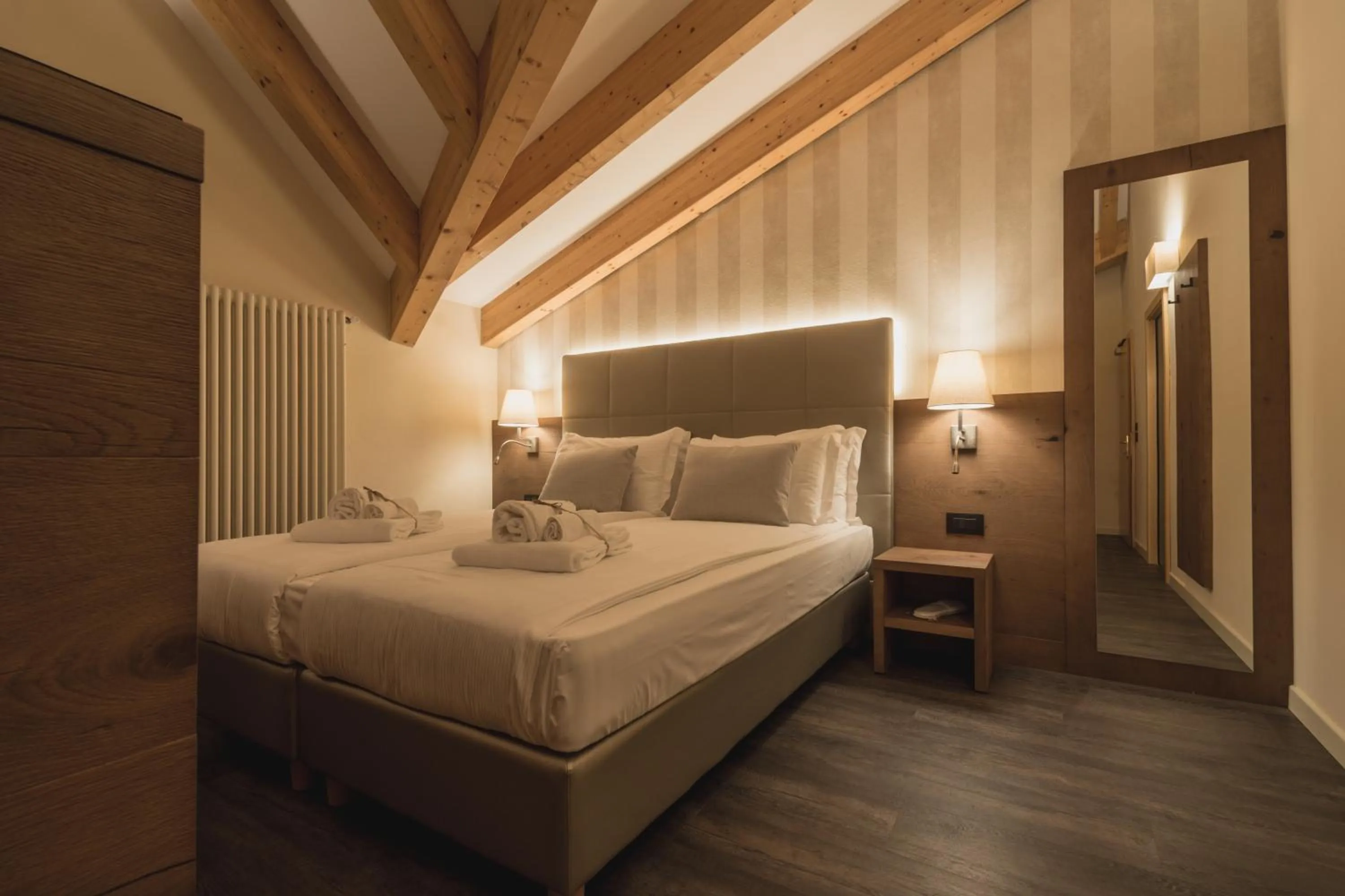 Bed in X Alp Hotel