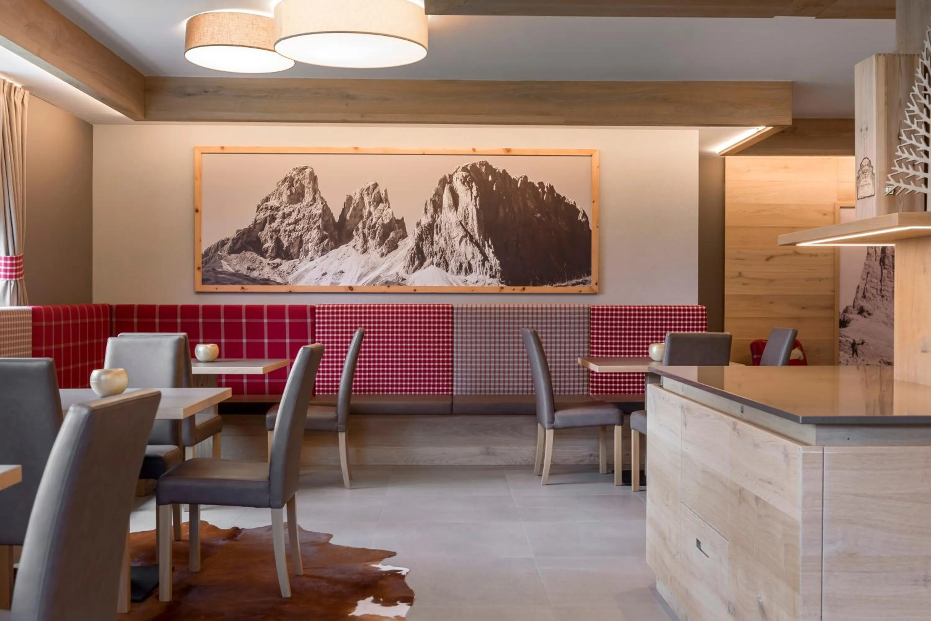 Communal lounge/ TV room in X Alp Hotel