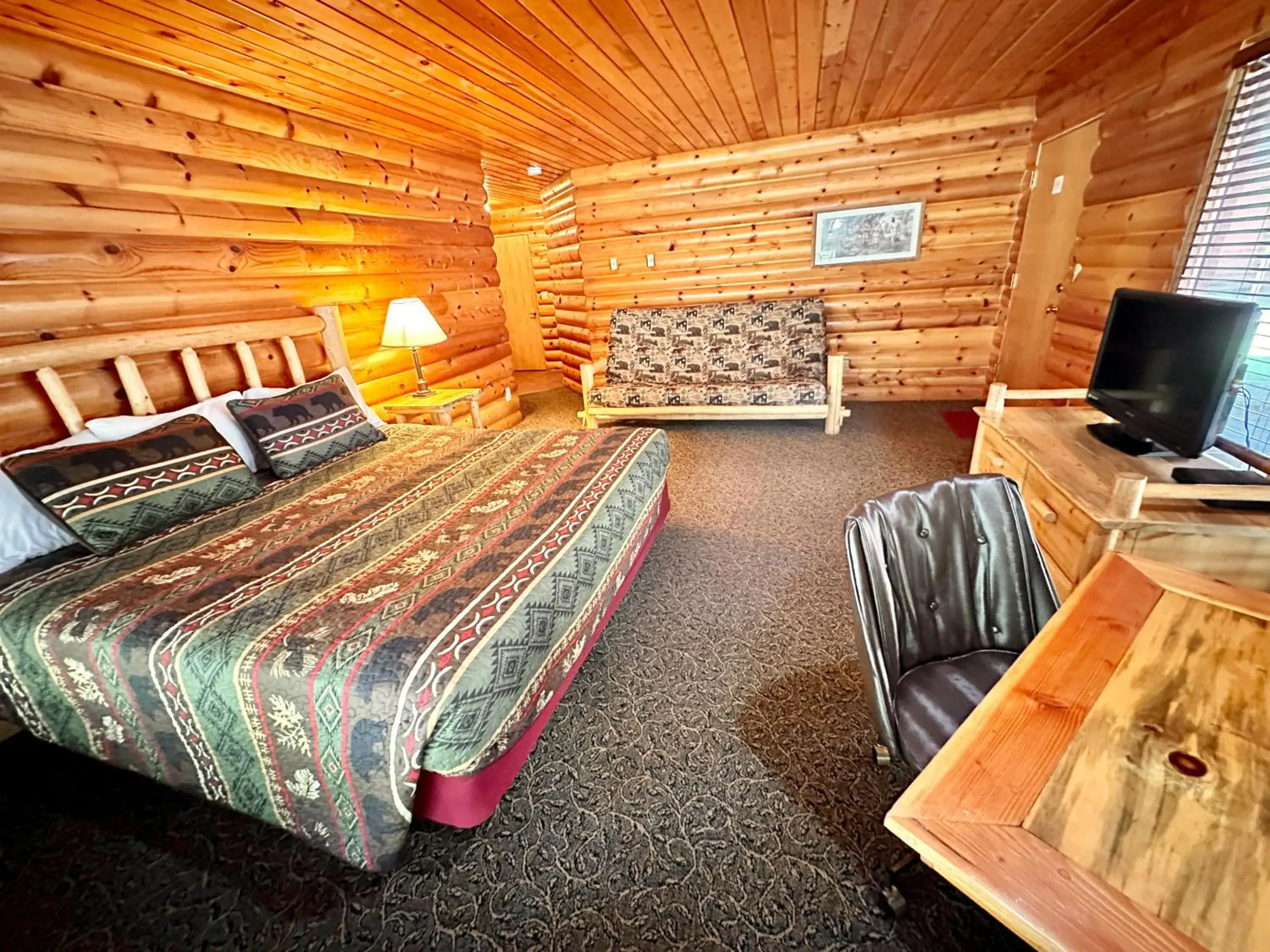 Deluxe King Room in The Lodge at Lolo Hot Springs Deluxe King Room in The Lodge at Lolo Hot Springs