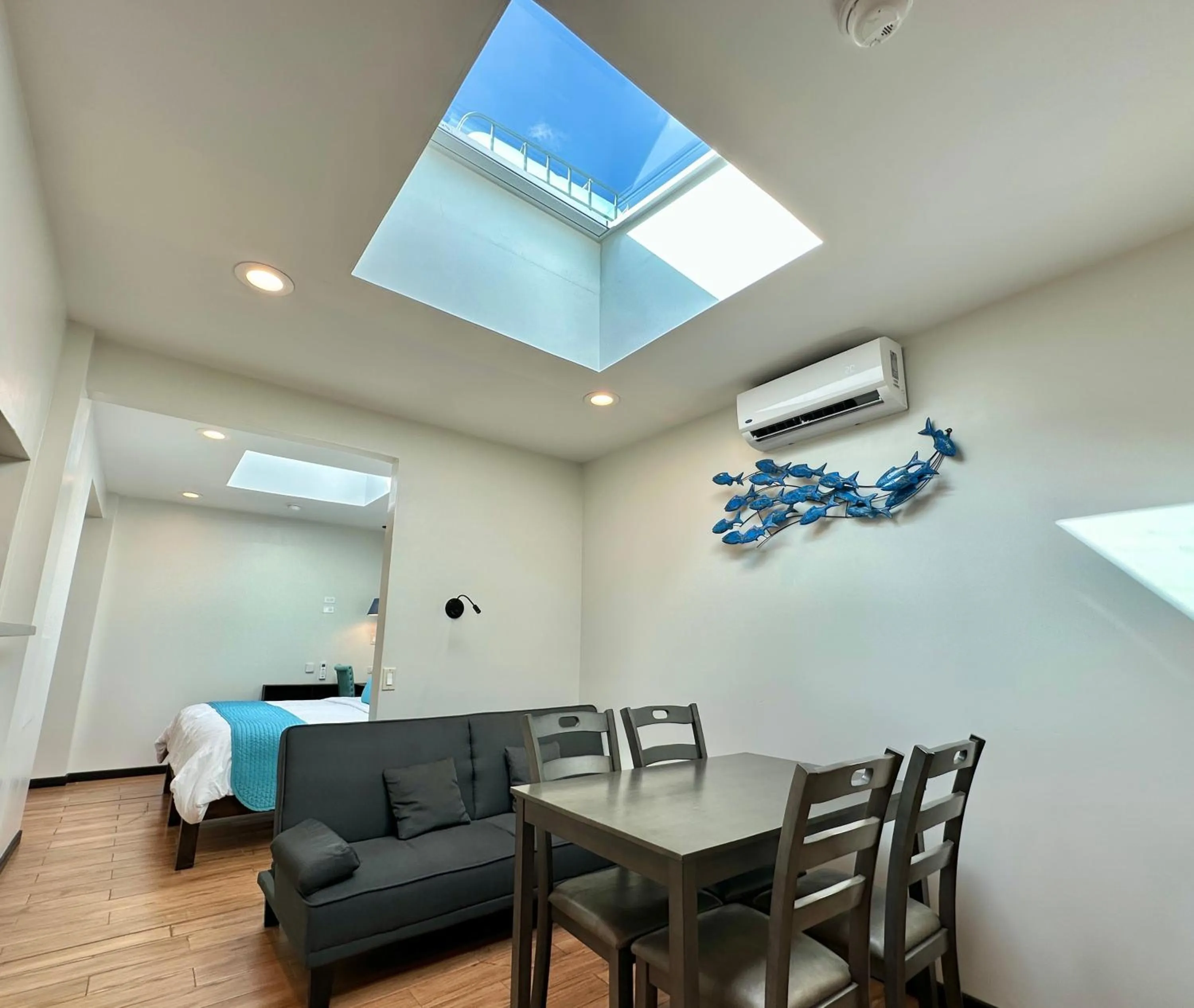 Living room, Bed in Palau Central Hotel