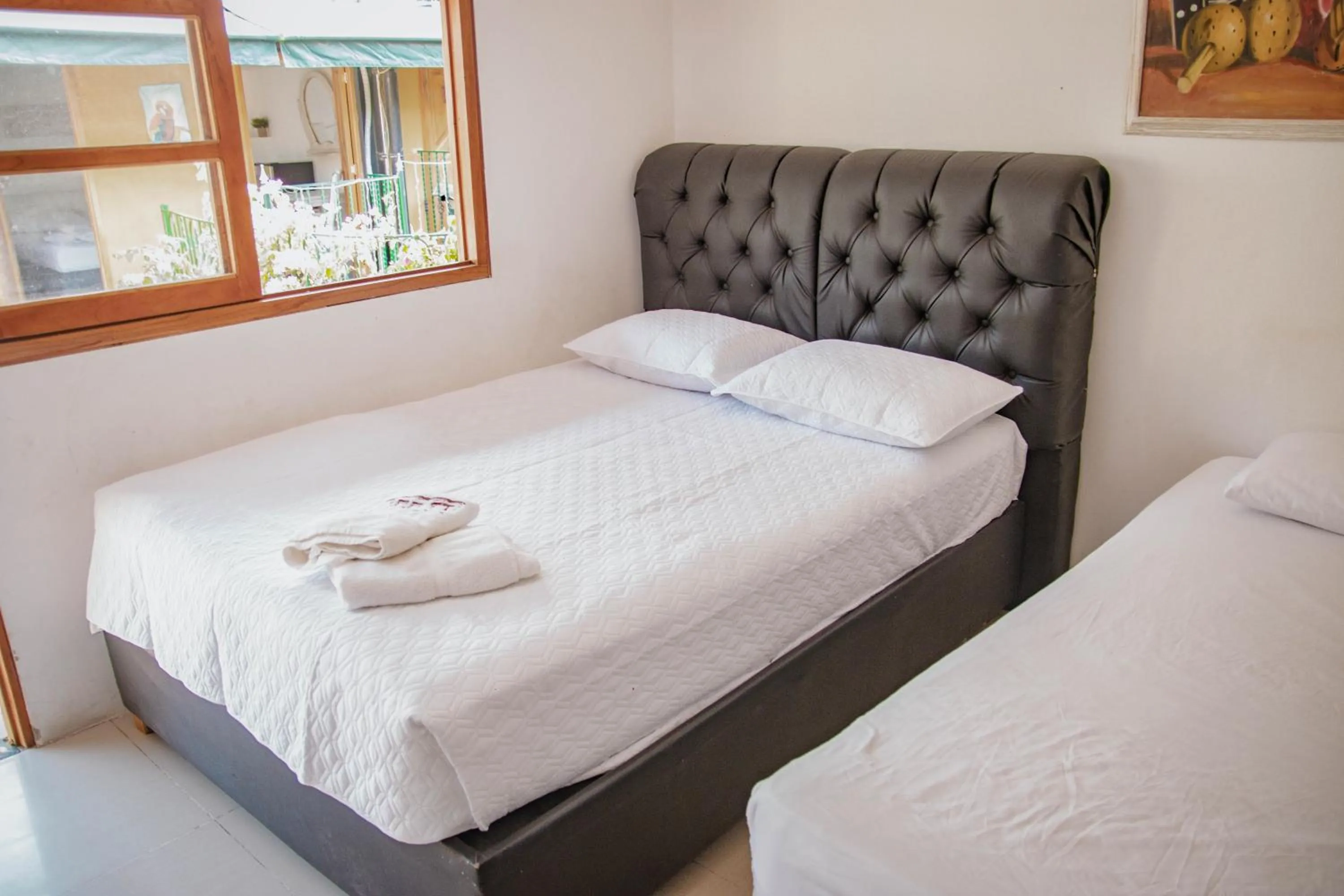 Bed in Hotel La Casona de Getsemani