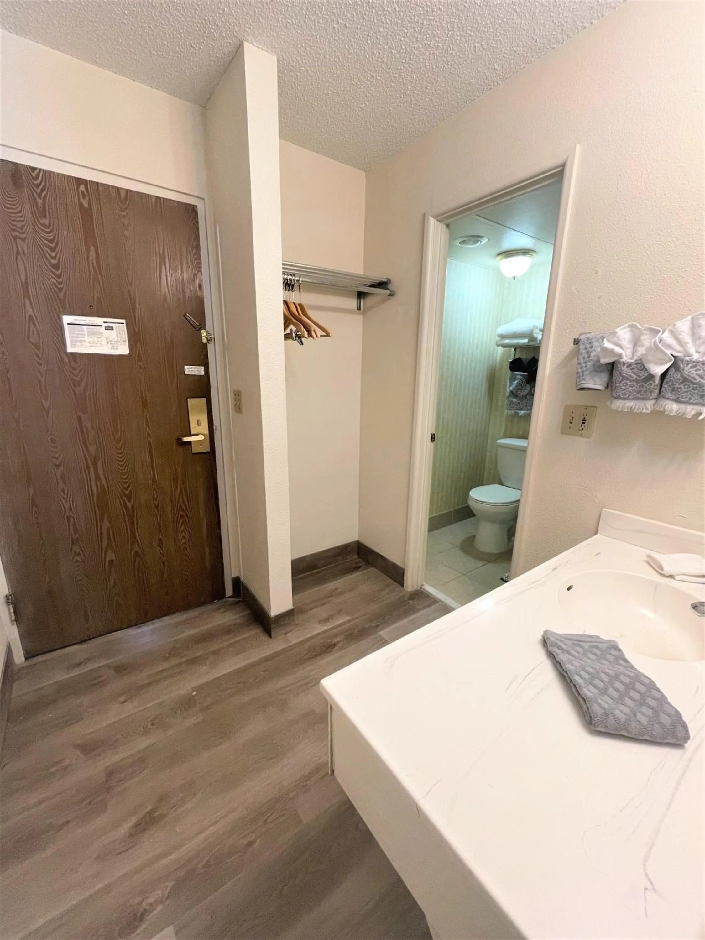 Bathroom in FairBridge Extended Stay, a Kitchenette Hotel