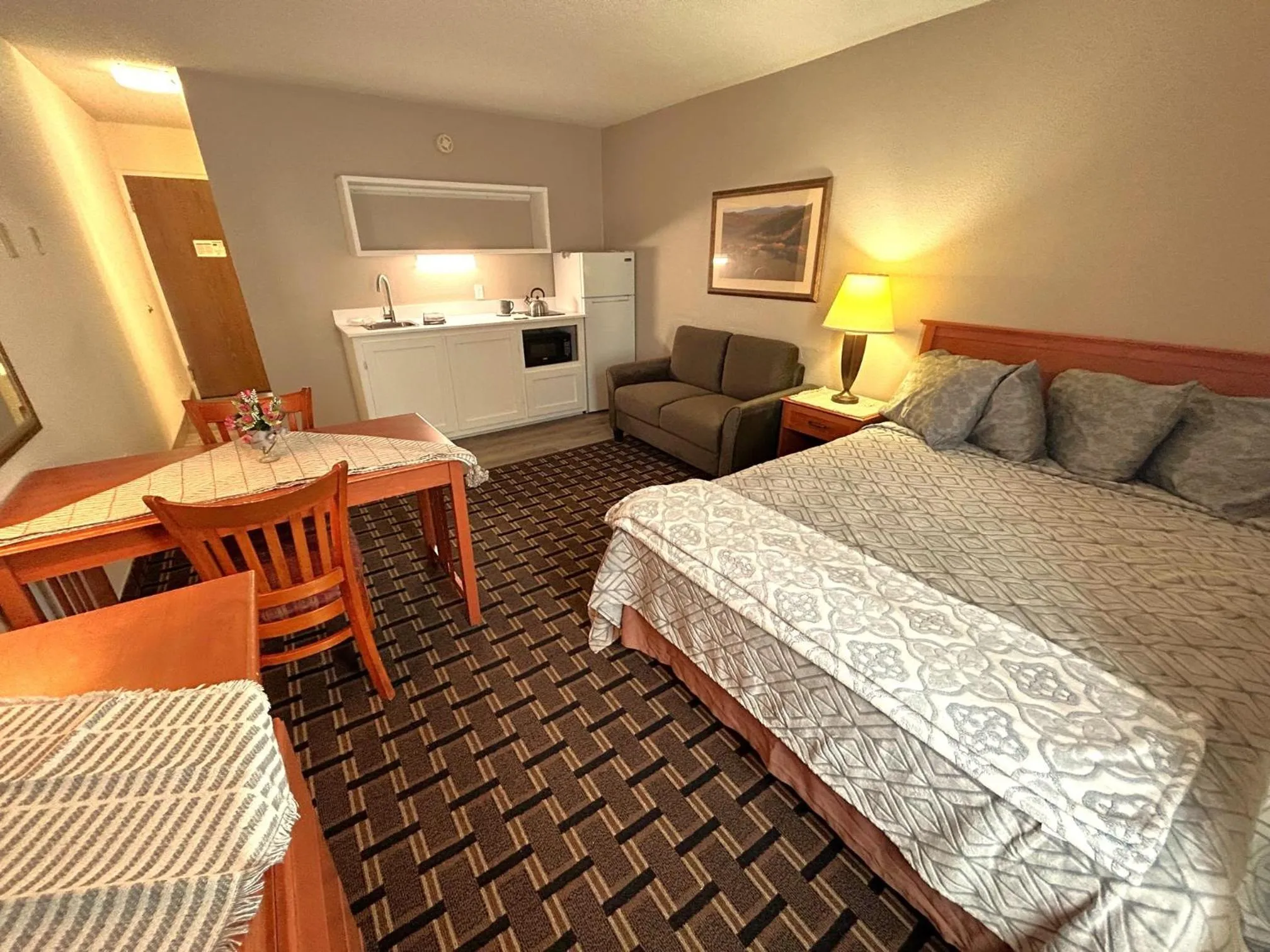 Photo of the whole room, Bed in FairBridge Extended Stay, a Kitchenette Hotel