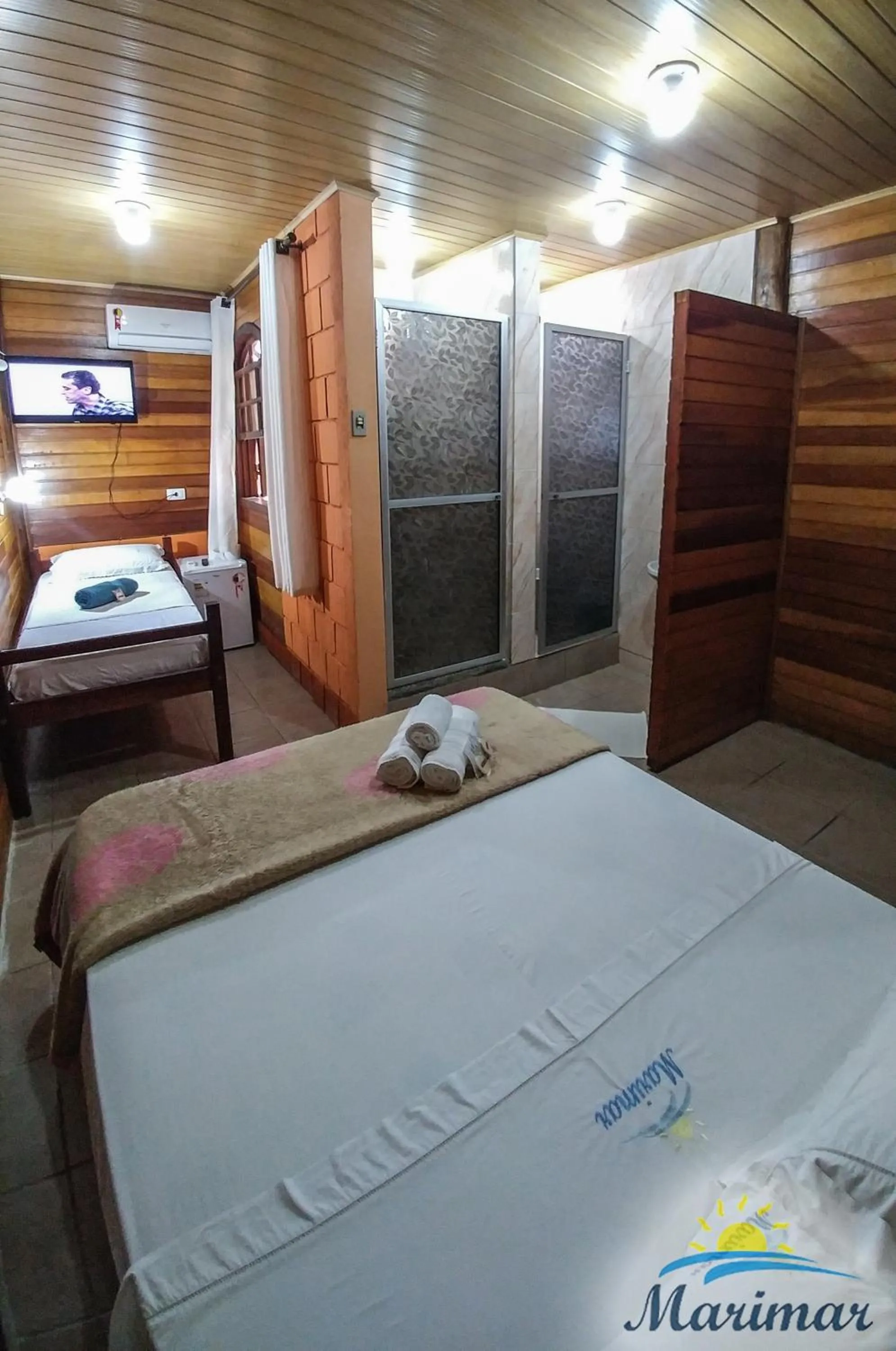 Bed in Pousada Marimar