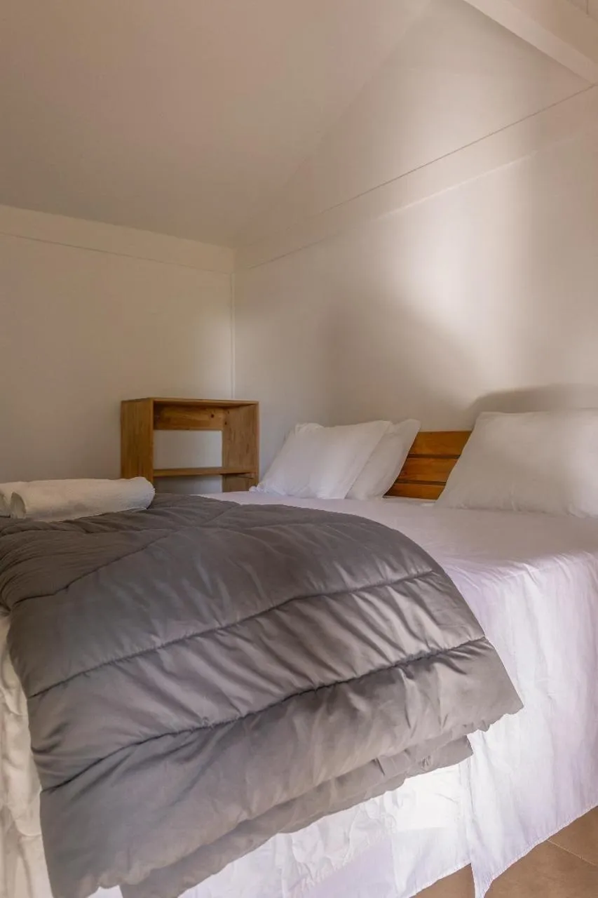 Bed in Pousada Marimar