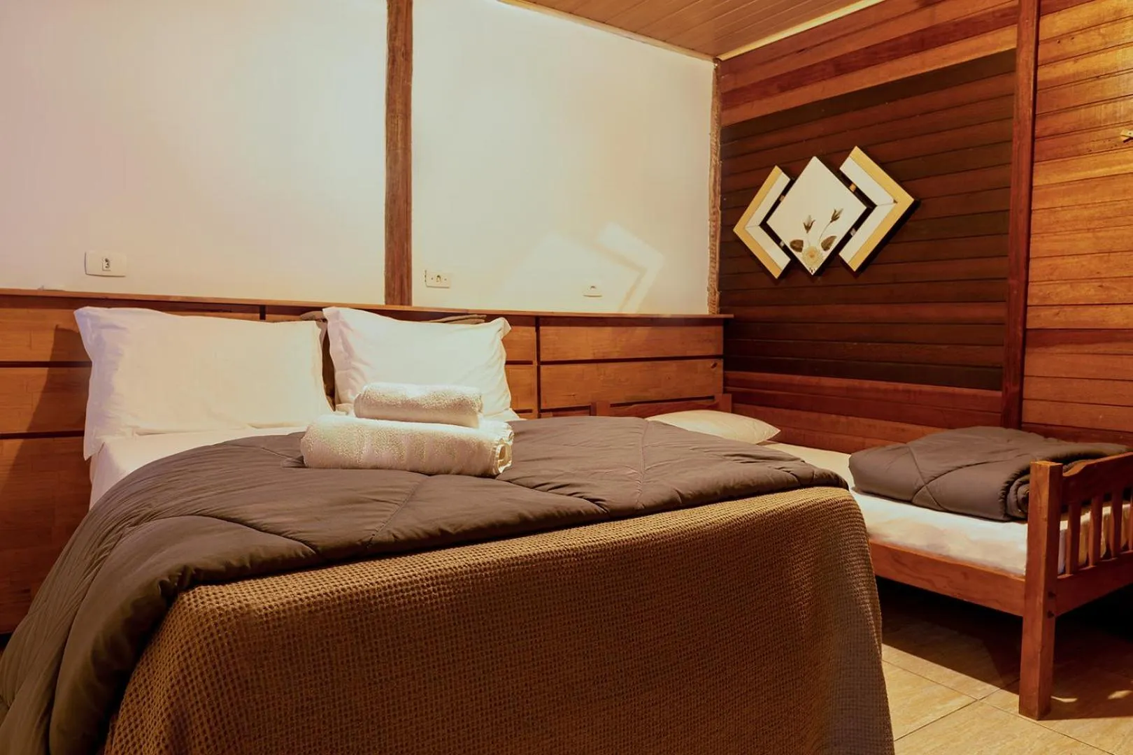 Bed in Pousada Marimar