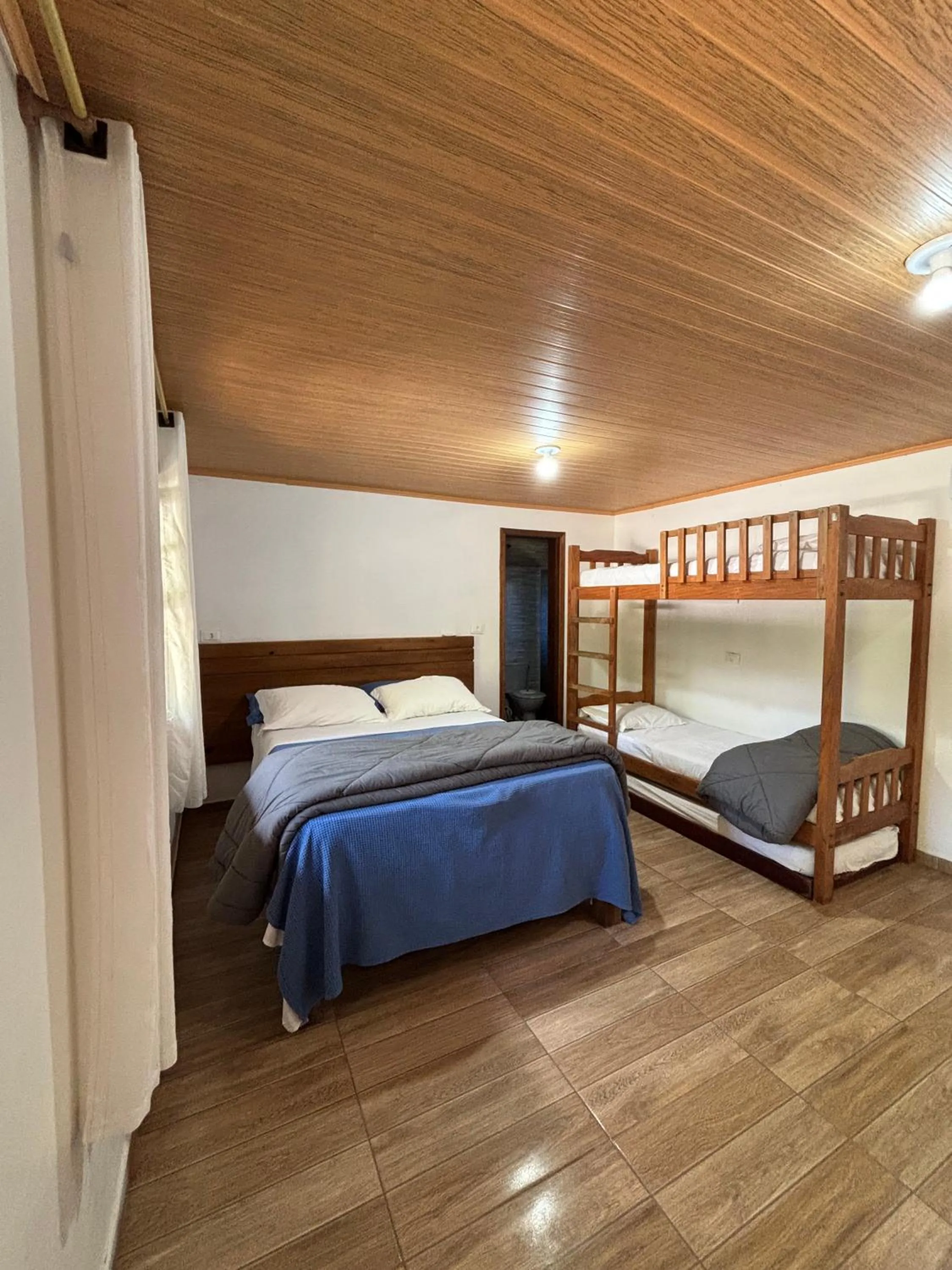 Bed in Pousada Marimar