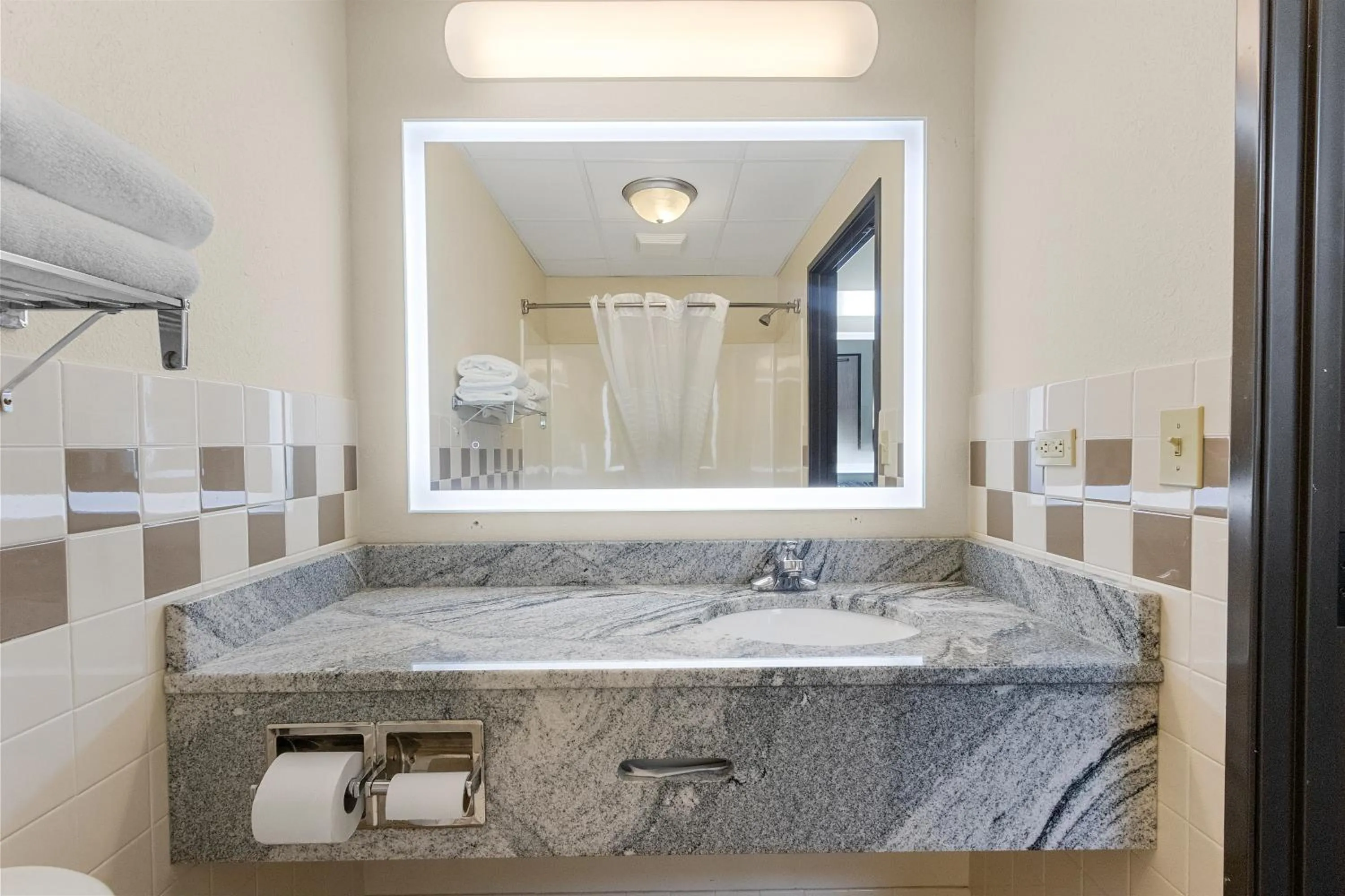 Bathroom in AmericInn by Wyndham Green Bay East