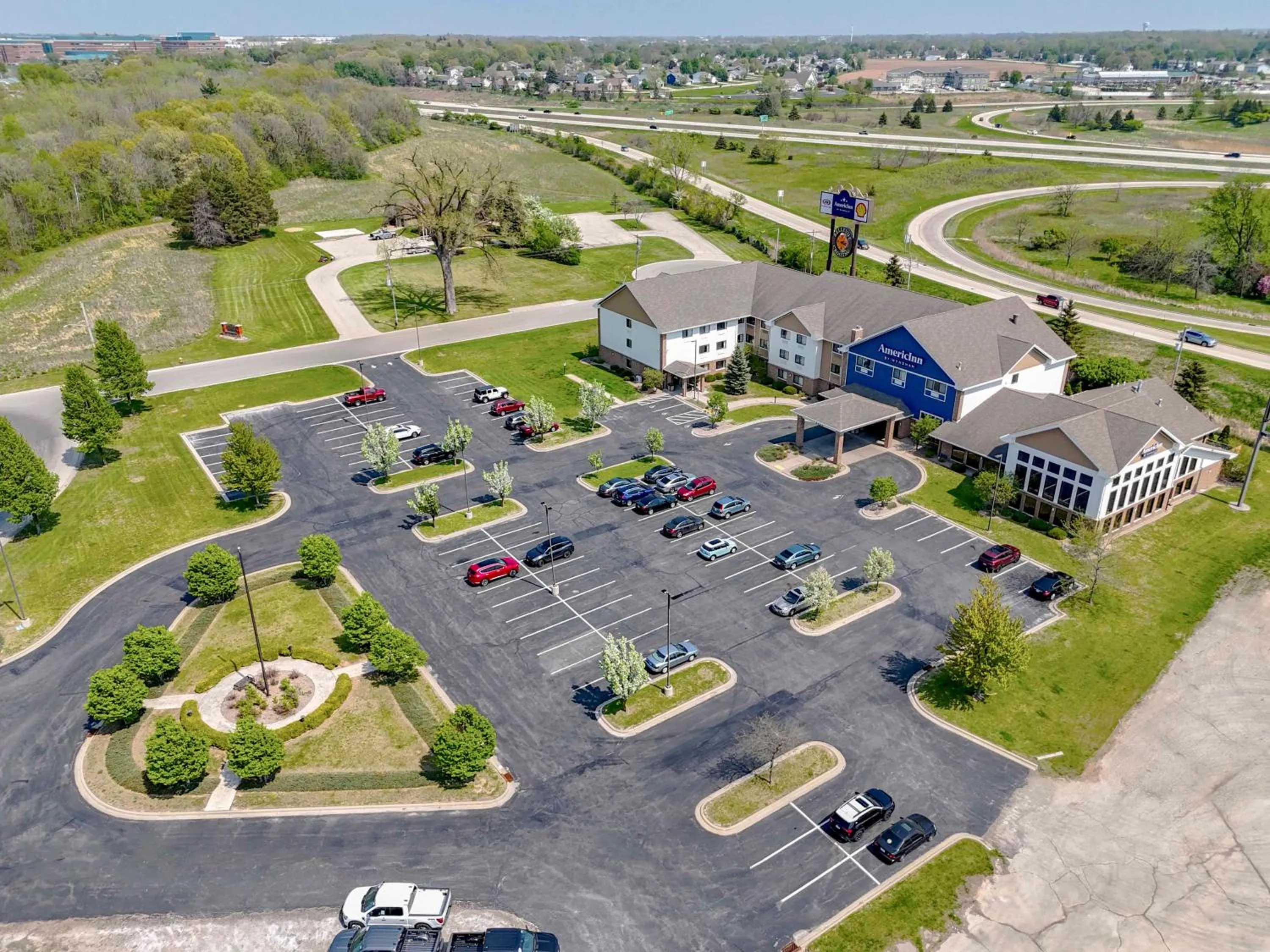 Property building in AmericInn by Wyndham Green Bay East