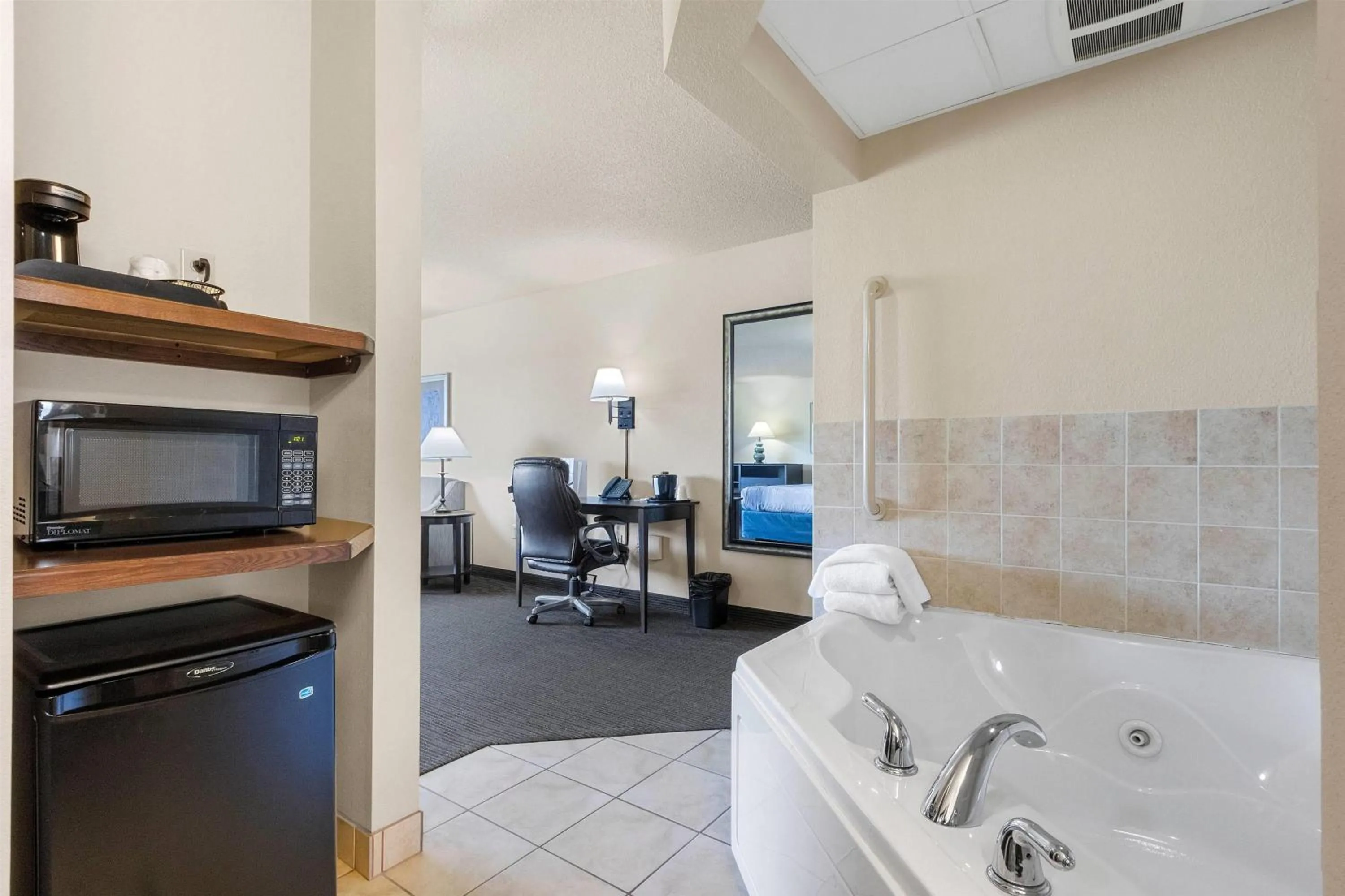 Bathroom in AmericInn by Wyndham Green Bay East