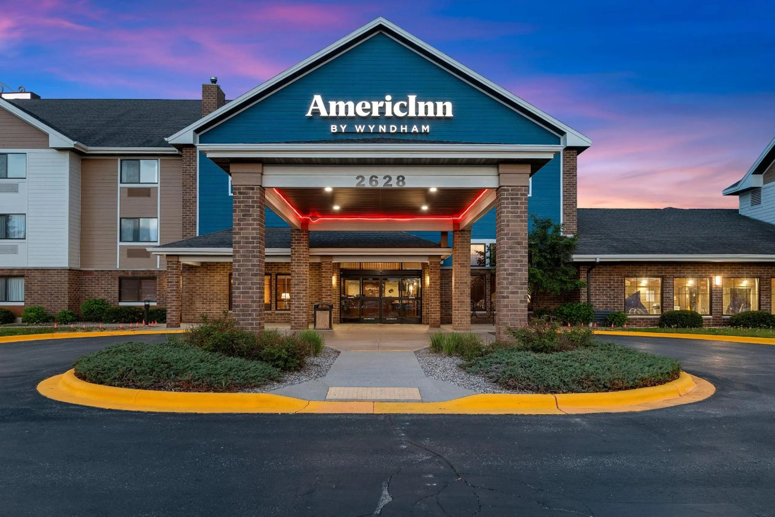 Property building in AmericInn by Wyndham Green Bay East