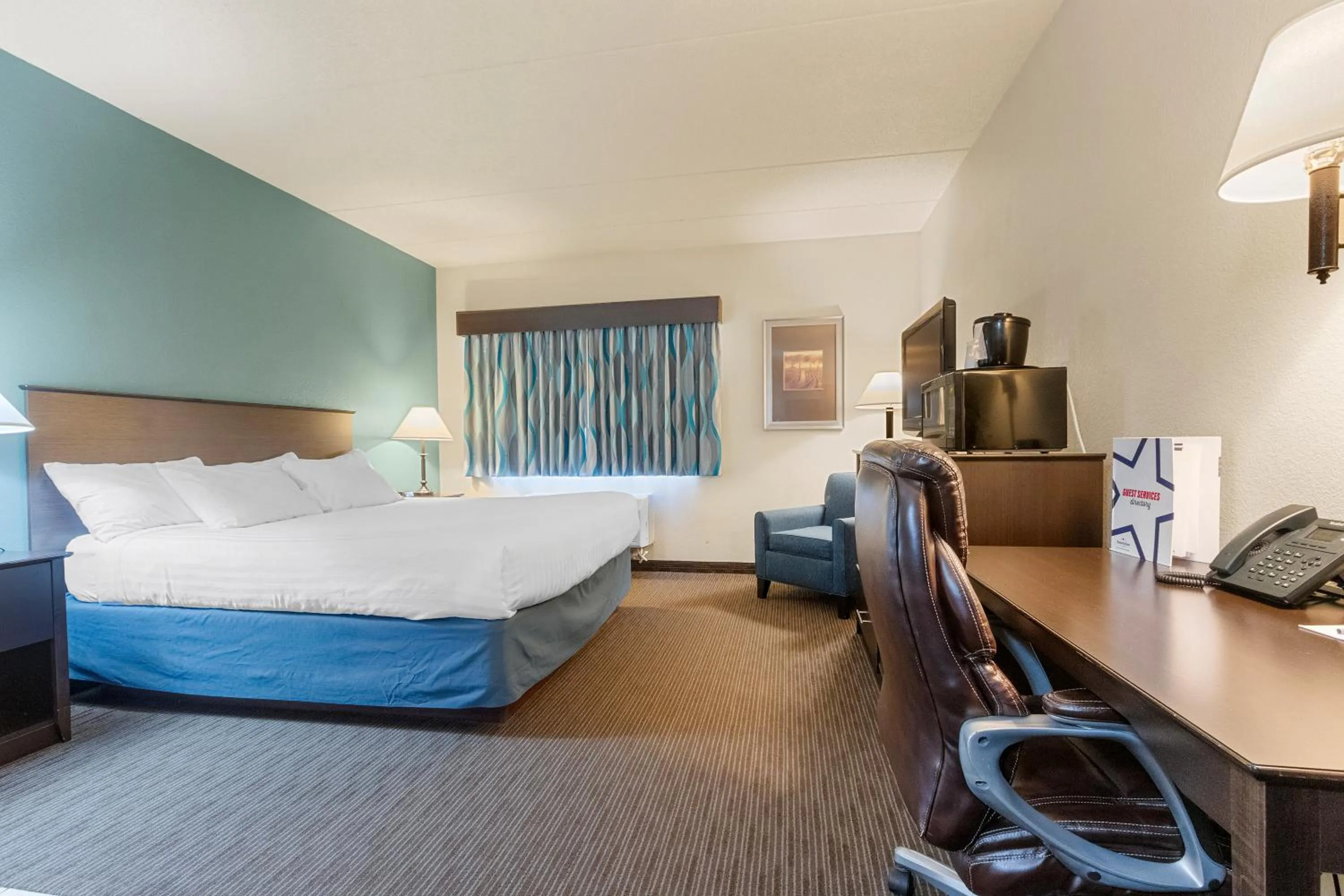 Photo of the whole room, Bed in AmericInn by Wyndham Green Bay East