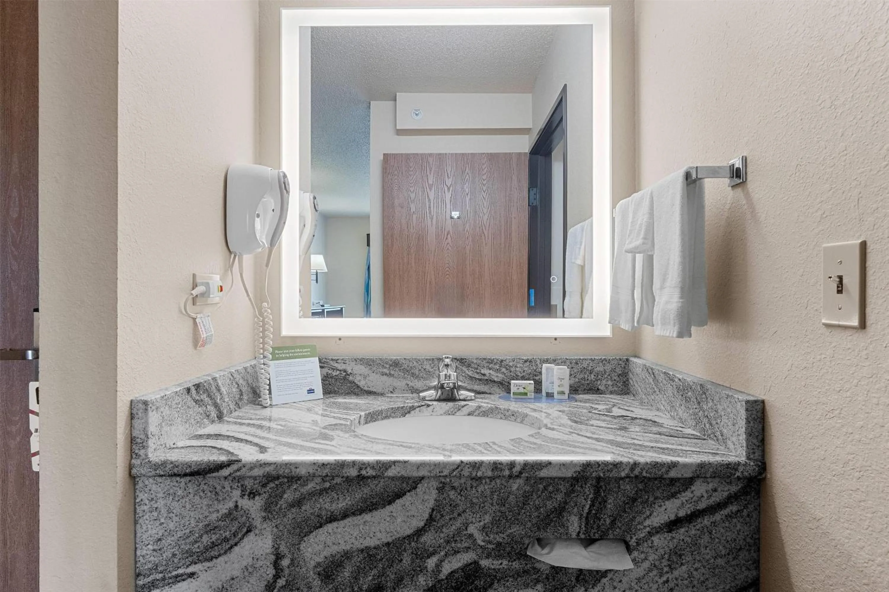 Bathroom in AmericInn by Wyndham Green Bay East