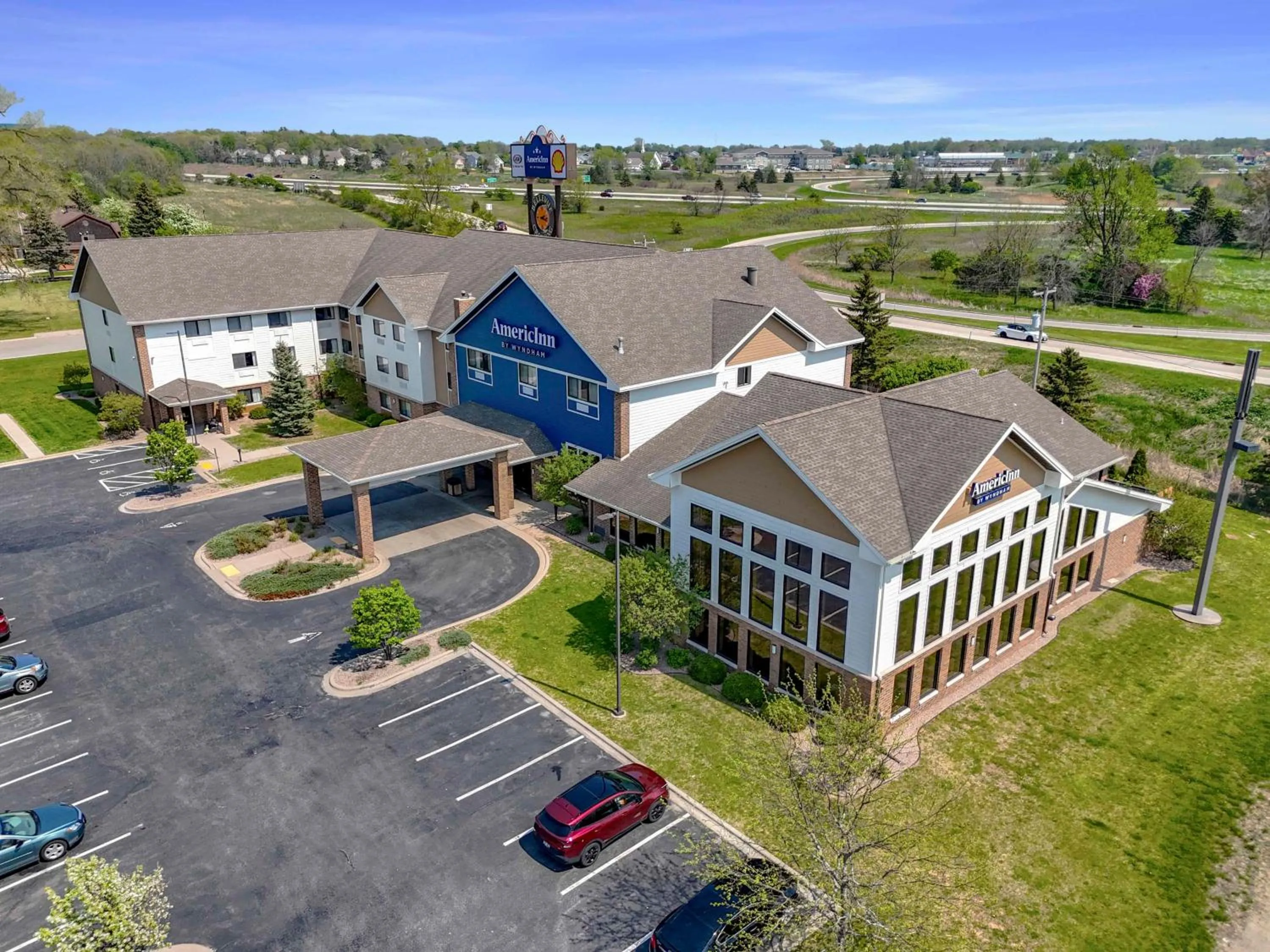 Property building in AmericInn by Wyndham Green Bay East