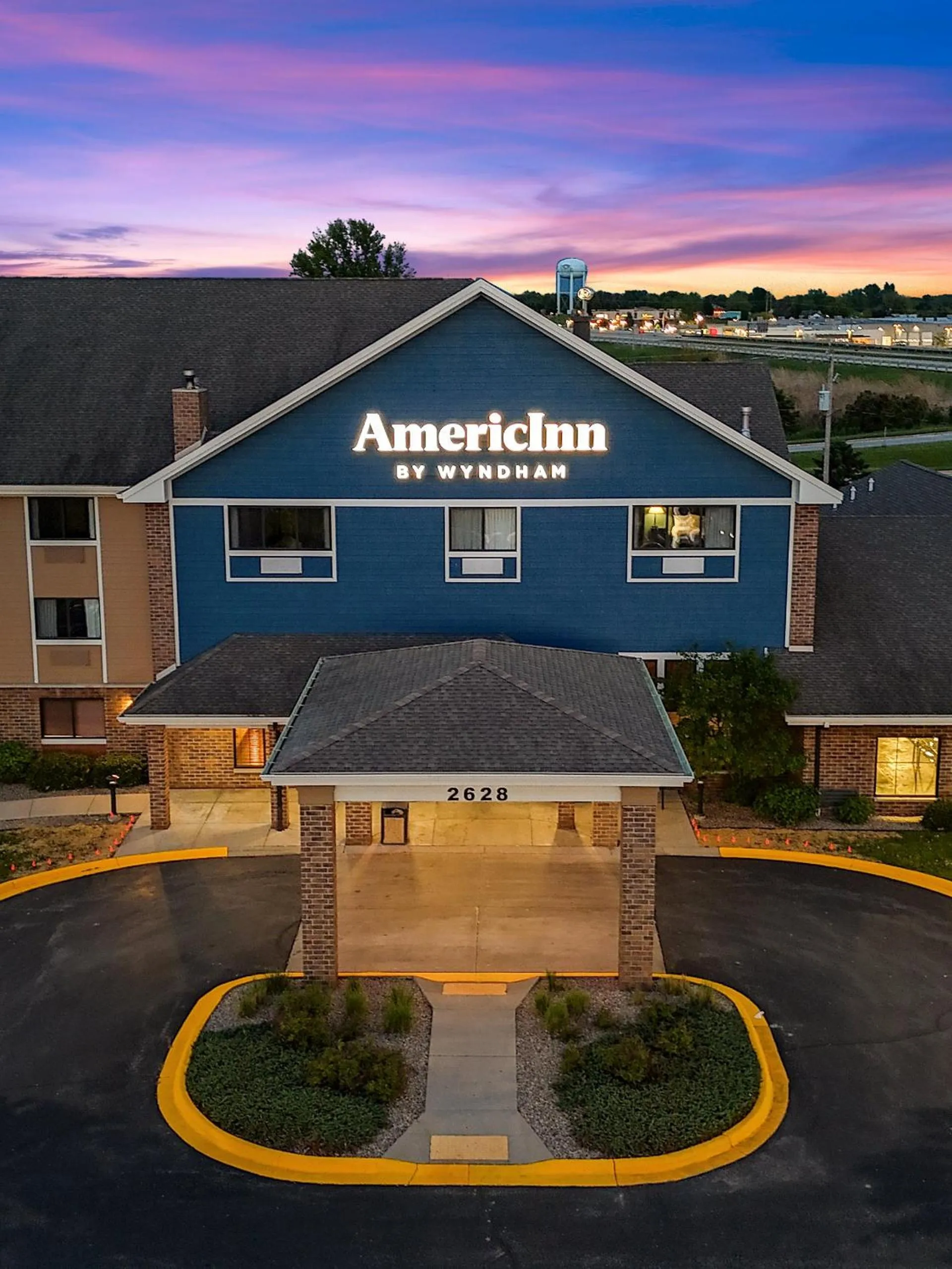 Property building in AmericInn by Wyndham Green Bay East